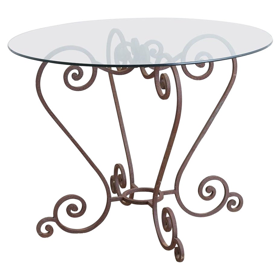 Table de déjeuner ou de jardin en fer forgé à volutes