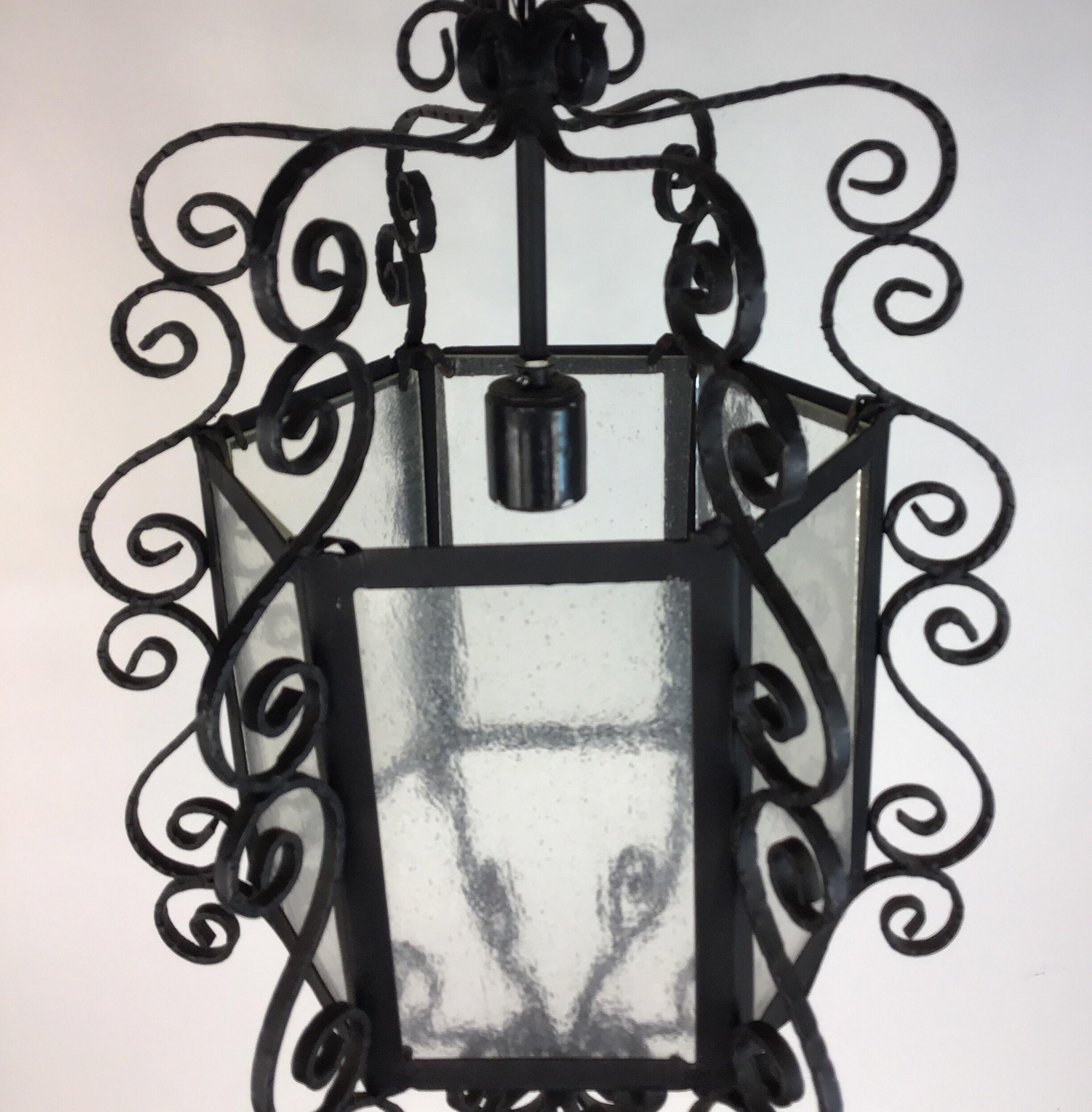 Large French Scrolled Hand Crafted  Iron  Lantern Circa 1940's In Good Condition In Douglas Manor, NY