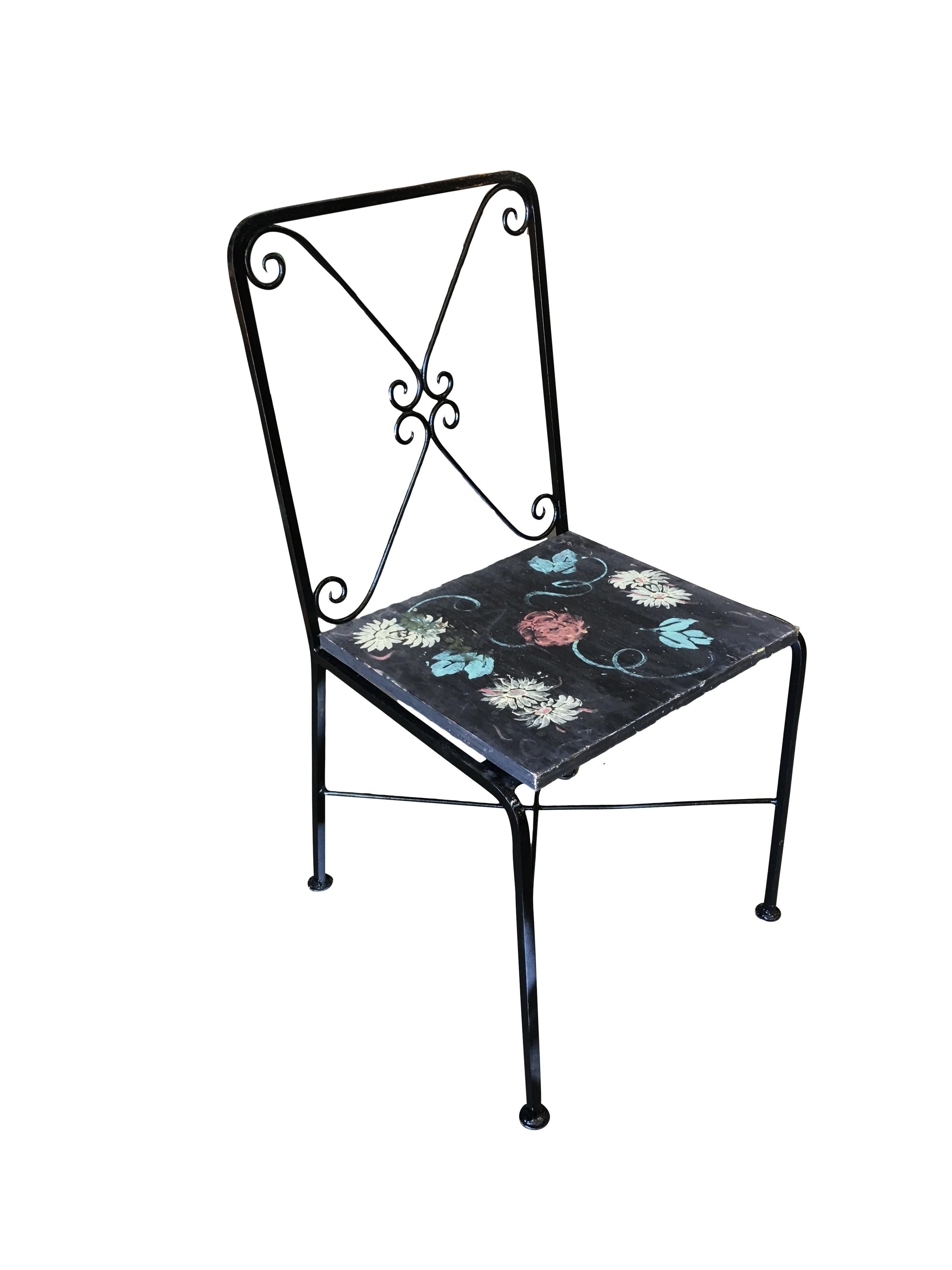 A set of four Scrolling rod iron patio chair with distinct scrolling backrest and Googie style fabric seat. This chair is constructed with solid core iron rods and is finished in your choice of a pure white or black finish with padded seats. Seat