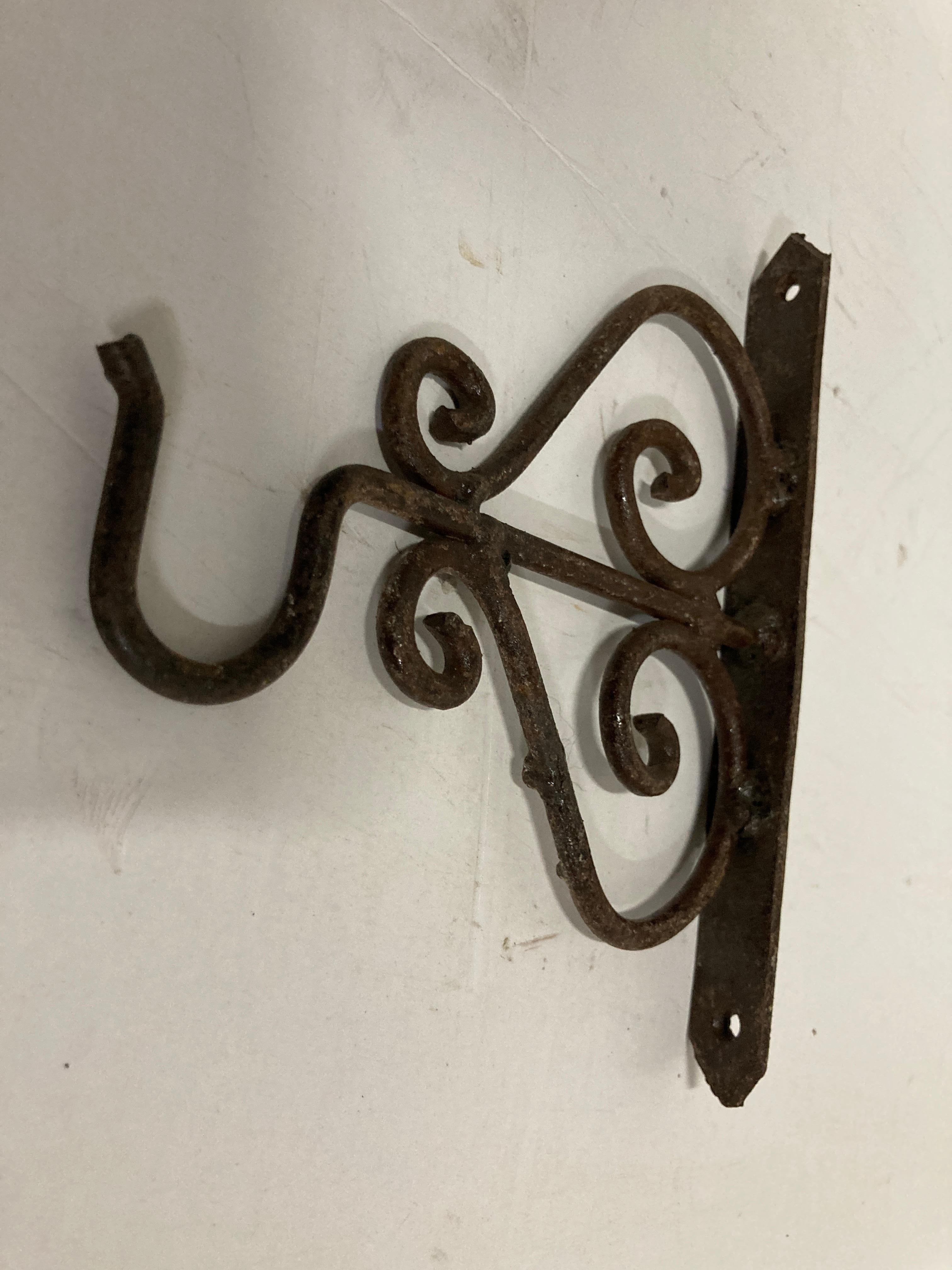 Hand-Crafted Scrolling Wall Mounted Iron Bracket for Lanterns or Signs For Sale