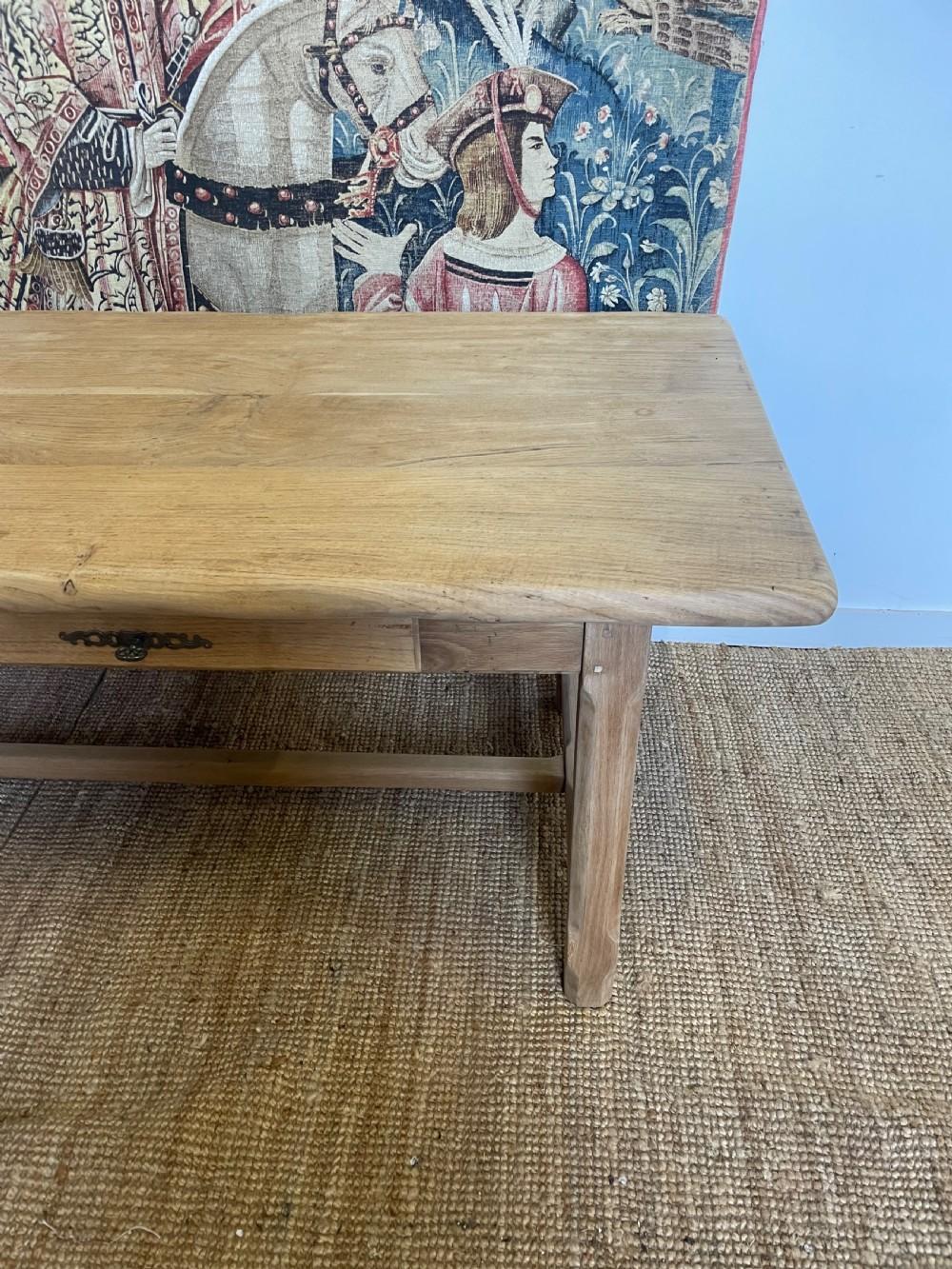 Mid 20th century oak farmhouse table
French , constructed from solid oak , washed and scrubbed for a contemporary feel
Will seat 6/8
Two drawers , faux keys , they are the drawer handles
Lengthy 220 cms
Width 81 cms
Height 77 cms
Height under rail