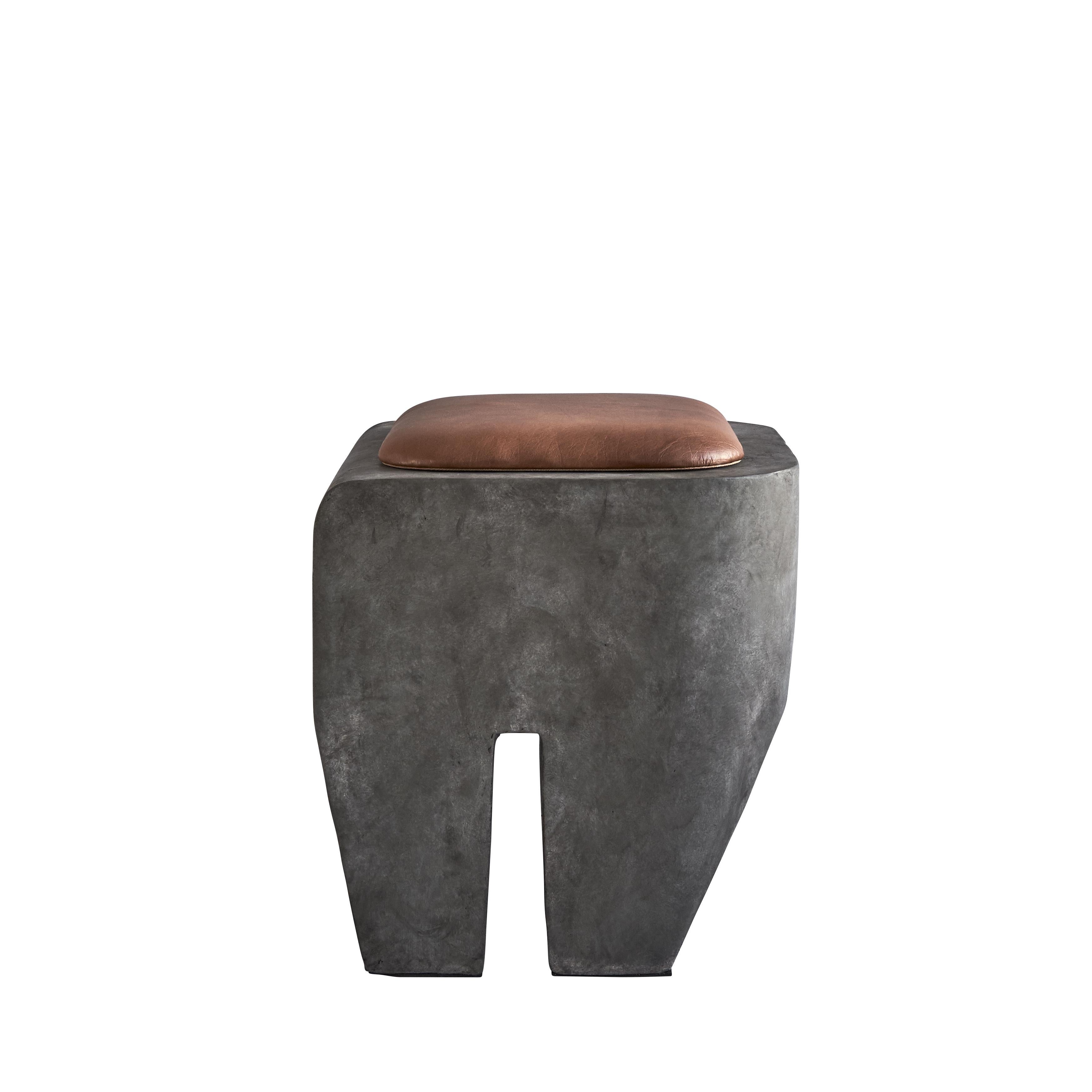 Sculpt Stool + Cushion by 101 Copenhagen
Designed by Kristian Sofus Hansen & Tommy Hyldahl
Dimensions: L45 / W45 /H45 CM
Materials: Fiber Concrete; Cushion: leather.

The design of the Sculpt stool is inspired by the Brutalist architecture that
