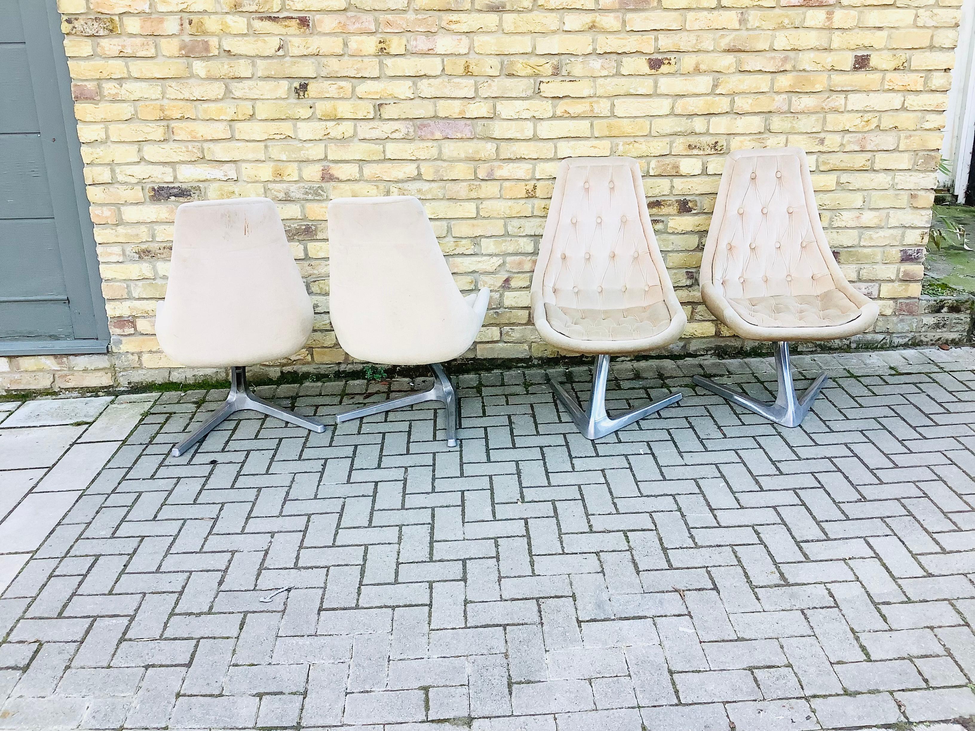 A set 4 swivel dinning chairs with a cast aluminum V shaped base.
Chairs are immortalized after appearing in two episodes of star trek in 
The 1960’s. Chairs are all original with some age wear to the back of one of the 
Chairs please see