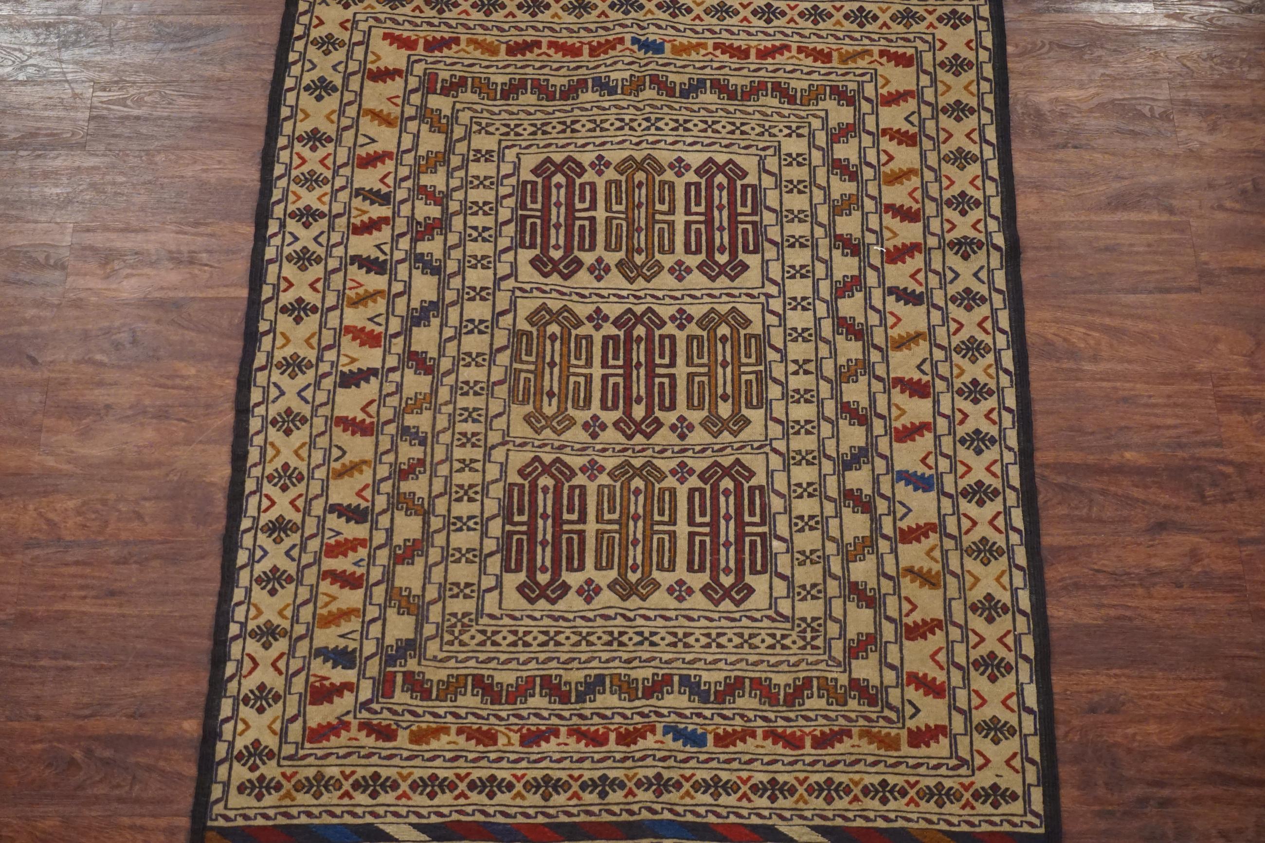 Fine black Afghan tribal area rug,

circa 1990

Measures: 4' x 6' 5