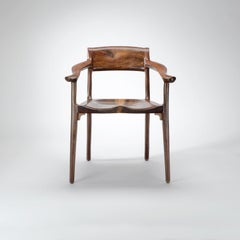 Sculpted and comfortable Sumi Arm Chair by Erickson Woodworking