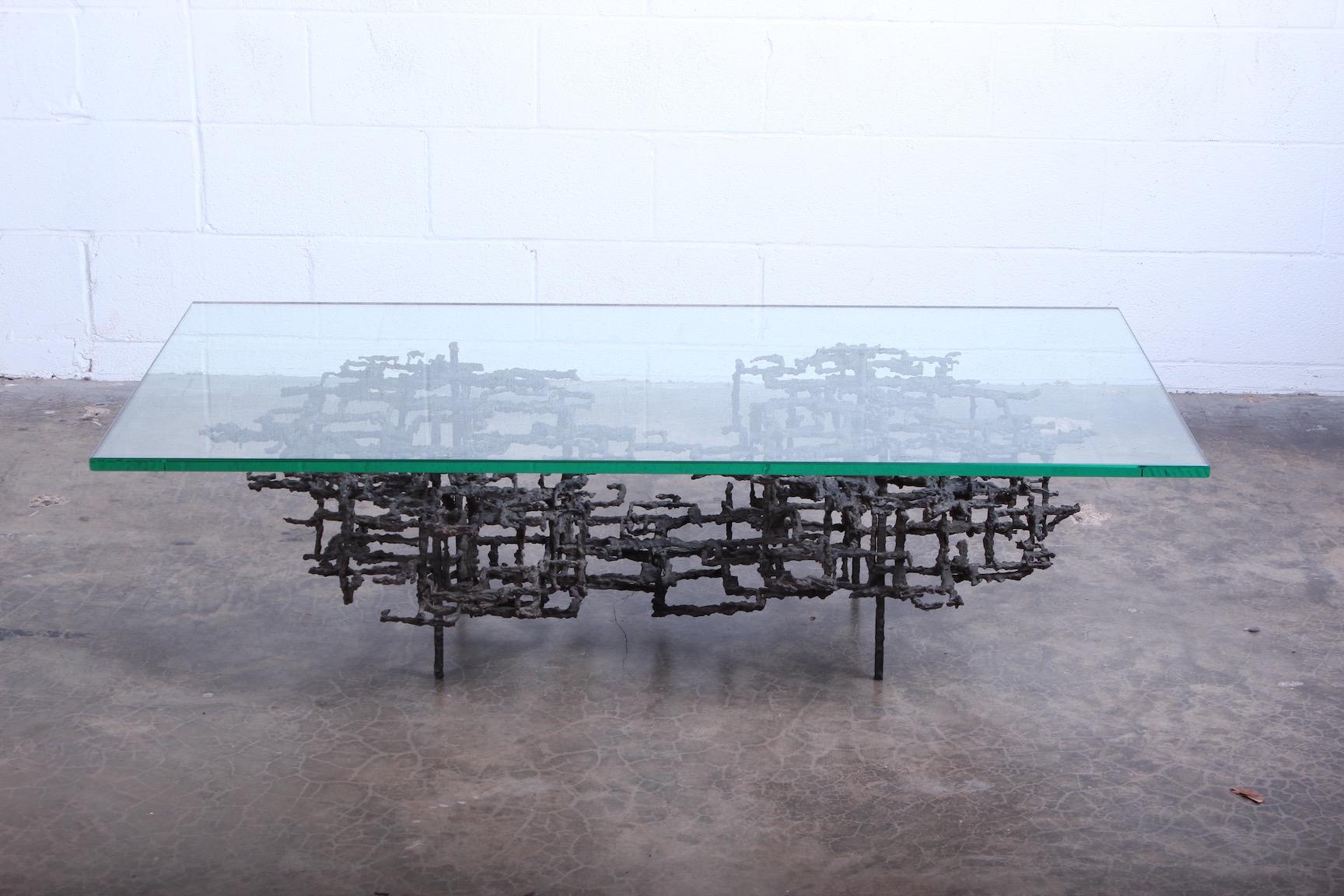 A sculpted bronze, Brutalist coffee table by Daniel Gluck.