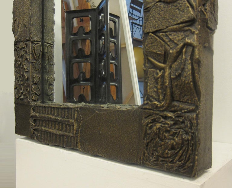 Late 20th Century Sculpted Bronze Mirror and Wall Mounted Console by Paul Evans For Sale