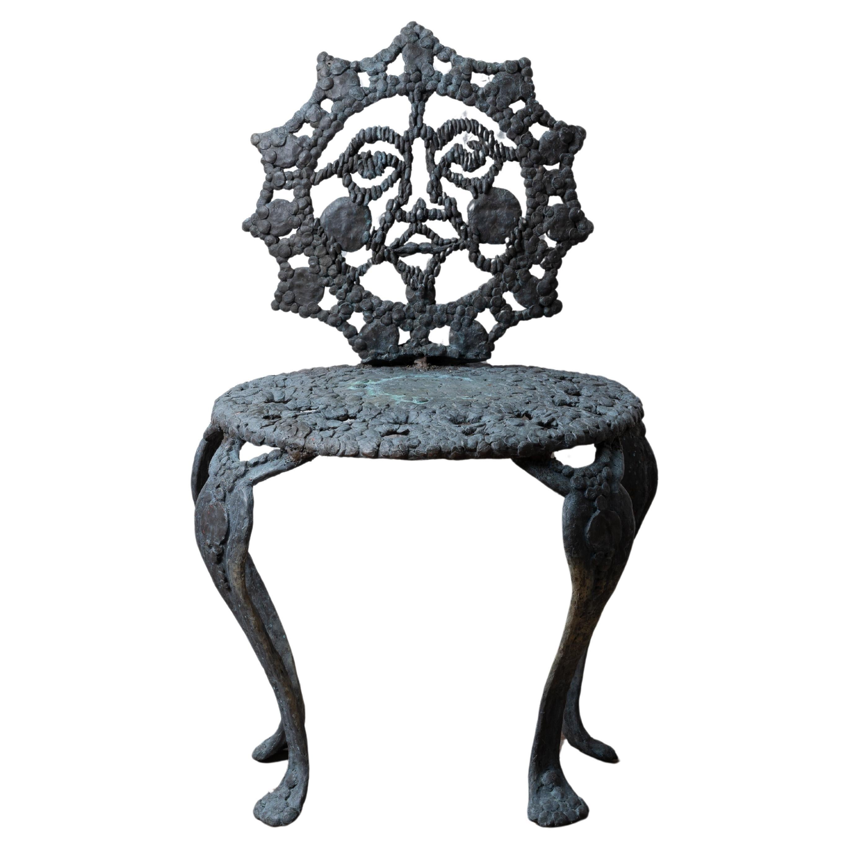 Sculpted Bronze Sun Face Chair For Sale