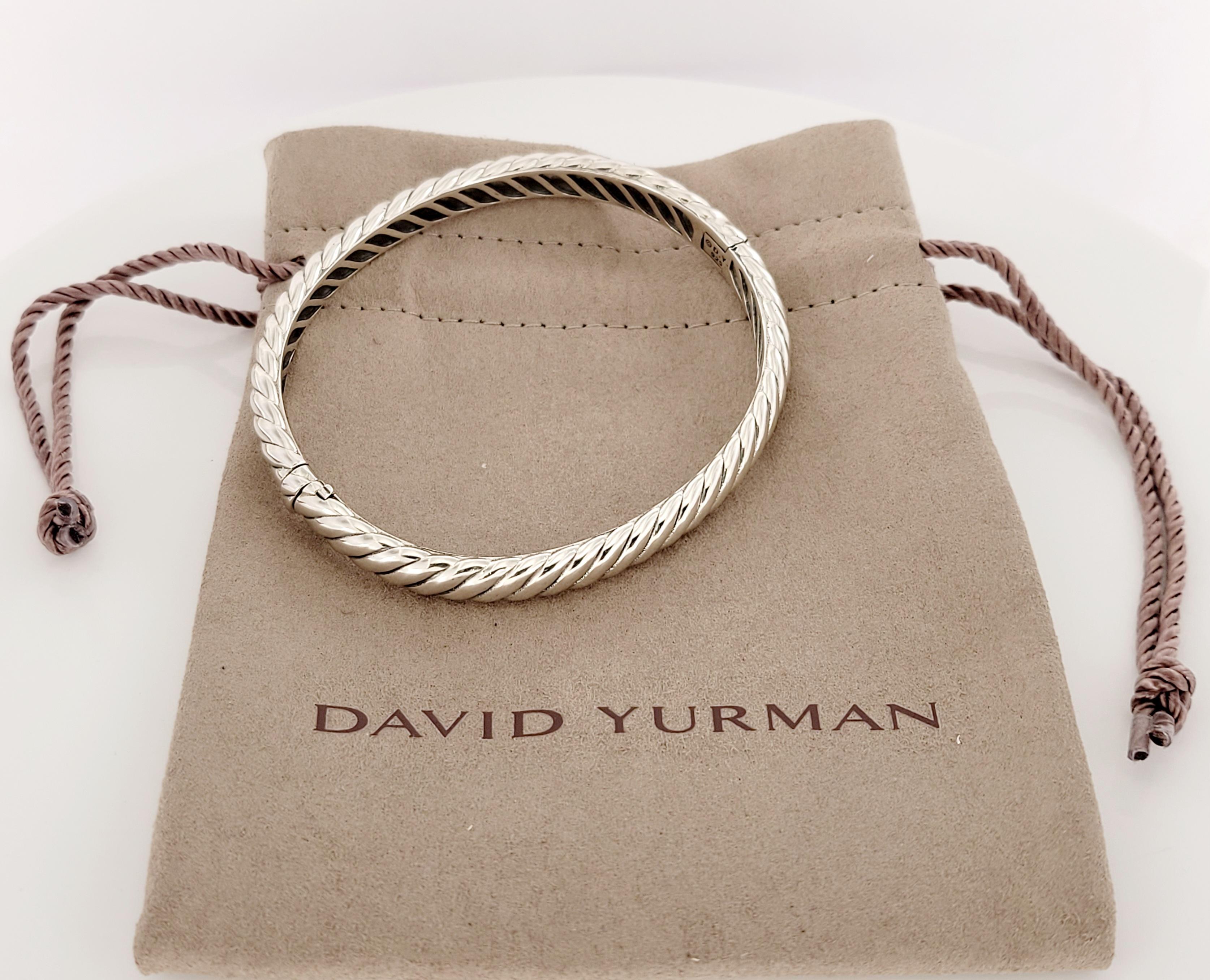 Brand David Yurman
Mint Condition
Medium size
Sterling Silver 
Bracelet 7mm
Weight 37.7gr
Retail price $650
Comes with David Yurman pouch