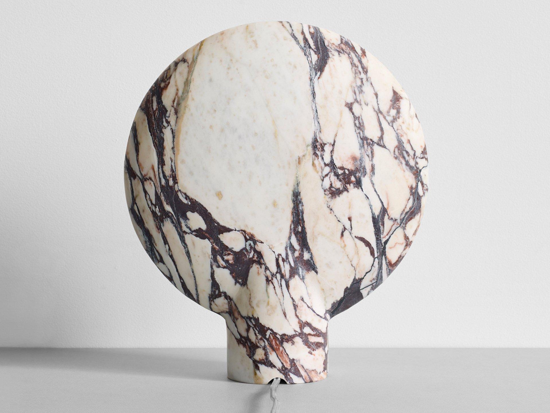 Sculpted Calacatta Viola marble lamp by Henry Wilson
This sculptural item is handmade in Sydney Australia.

The lamp is an ambient, sculptural light carved in two halves from solid stone.

Each light is manufactured in natural stone, meaning