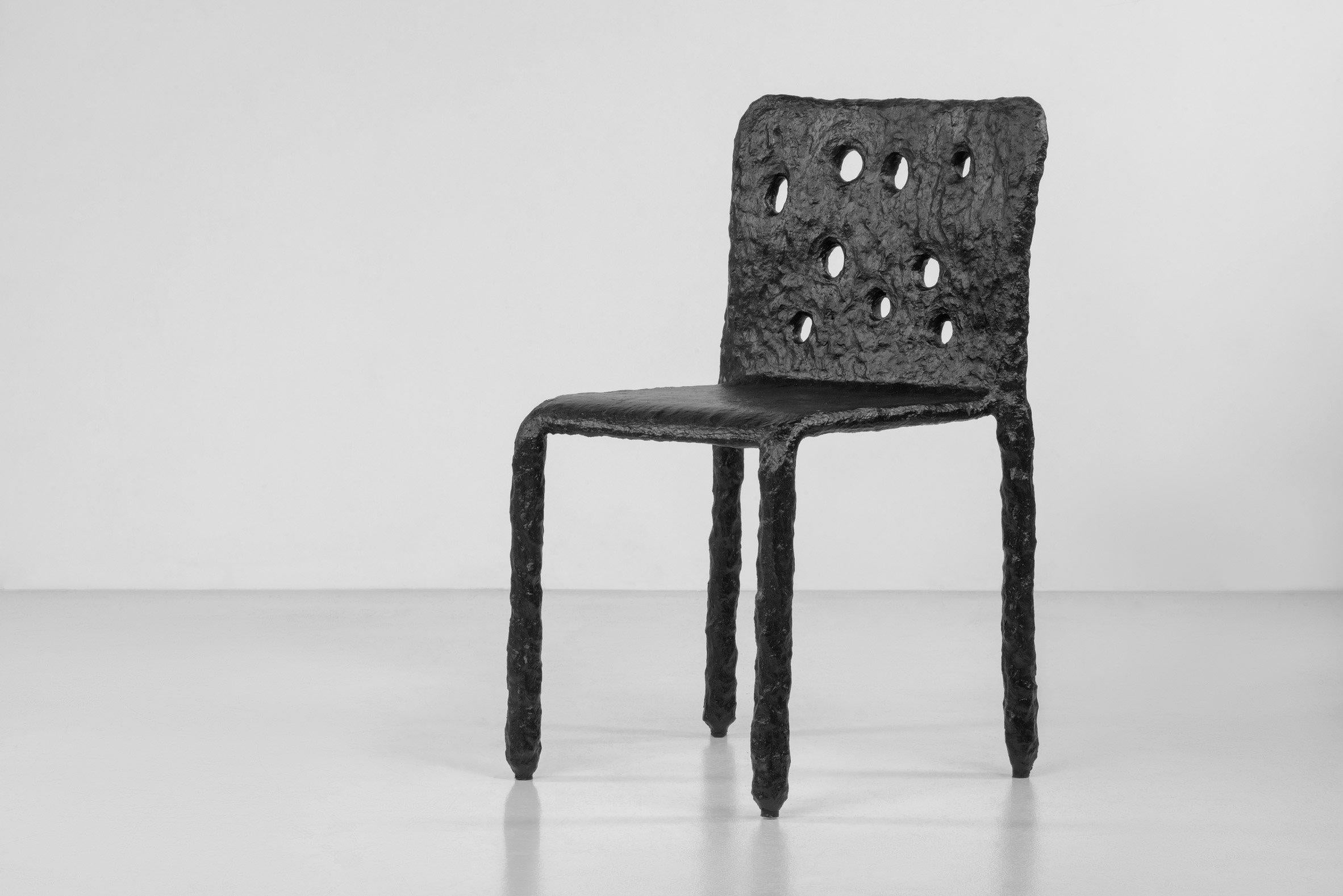 Sculpted contemporary black chair - Ztista Chair by Faina

Design: Victoriya Yakusha
Material: steel, flax rubber, biopolymer, cellulose
Dimensions: 48 x 50 x h82 cm, seat height: 47 cm
Handcrafted in Ukraine

Chair Ztista (“ztista” in