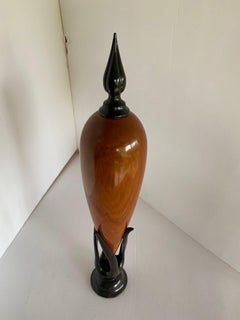 Escultura de ébano y madera de Chakte Kok "Vasija hueca" nº 14 de Don Comer Lacma