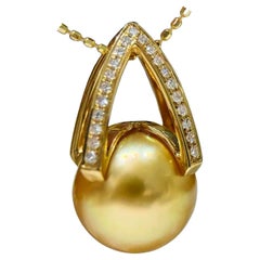 【Geometria scolpita 】Ciondolo con diamante e perla dorata dei mari del sud