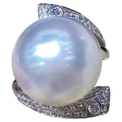 Anello con diamante e perla dei mari del Sud, oro bianco 18k