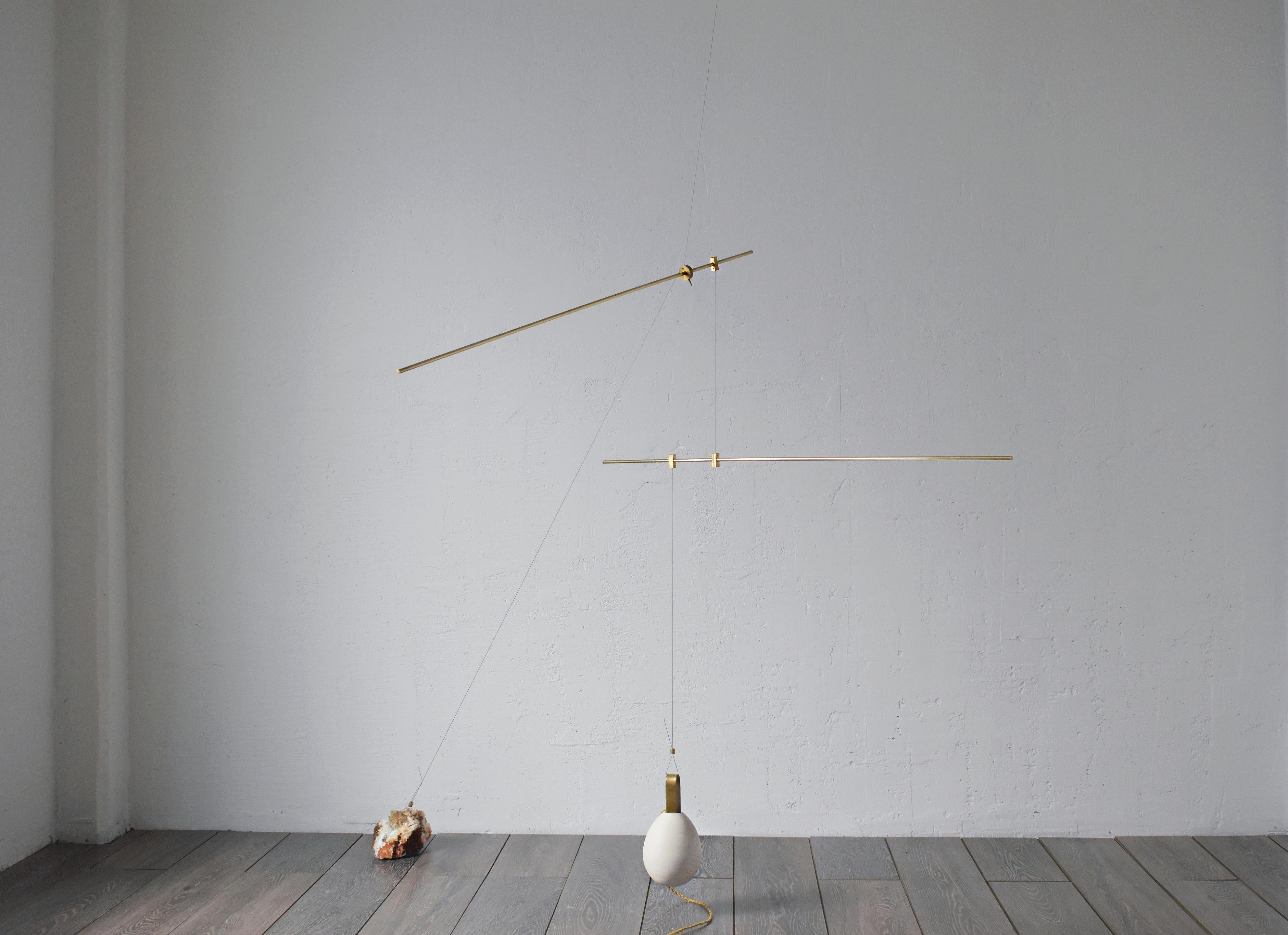 Sculpted Lighting Becoming Us by Periclis Frementitis
Signed by Periclis Frementitis
Studio: HIGHDOTS
Dimensions: D 100 x W 130 x H 140 cm
Materials: Brass, raw stone, porcelain, G4 LED bulb.


Total drop length: customizable. please contact
