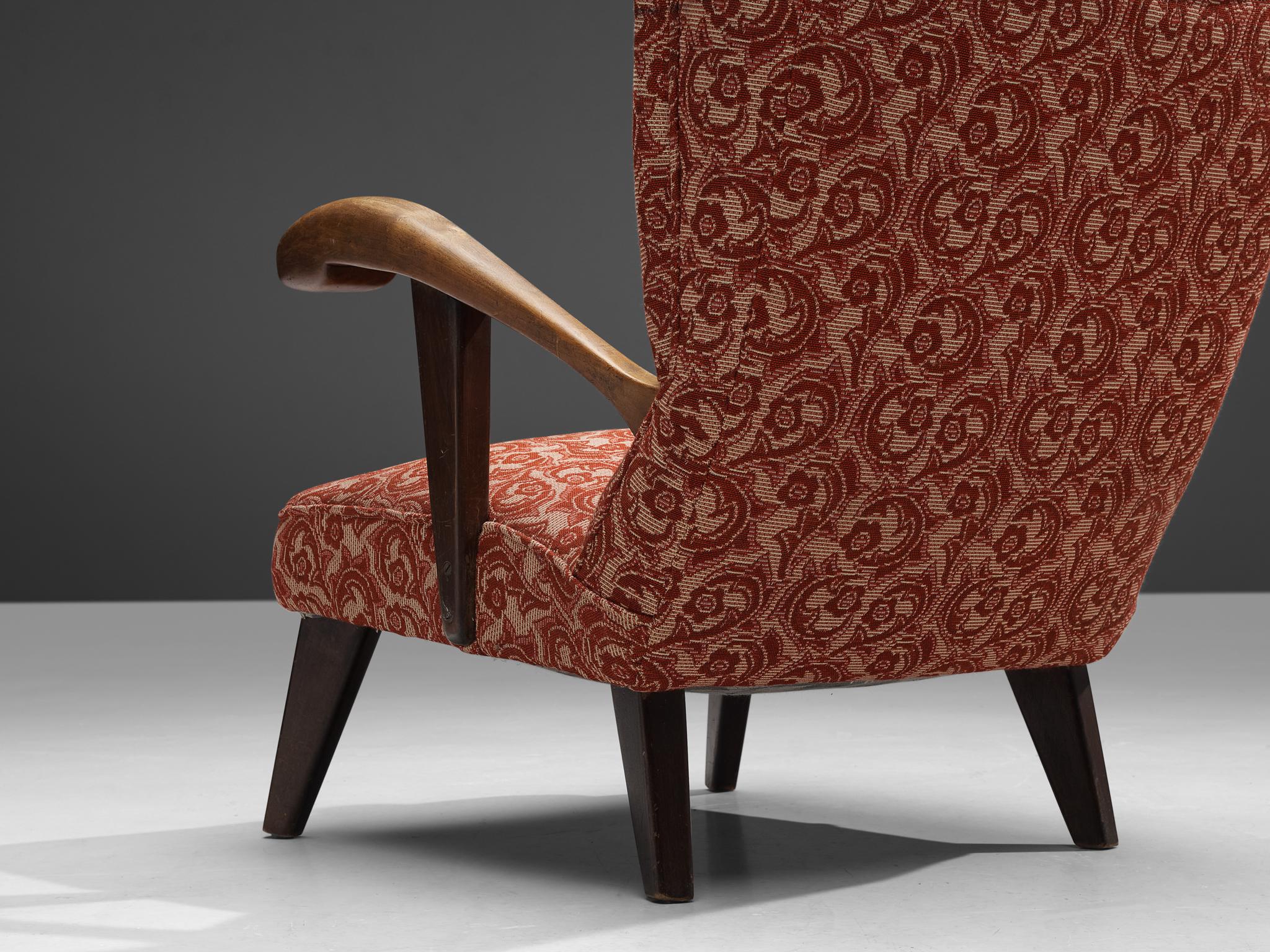 Mid-20th Century Sculpted Lounge Chair in Walnut and Red Floral Upholstery For Sale