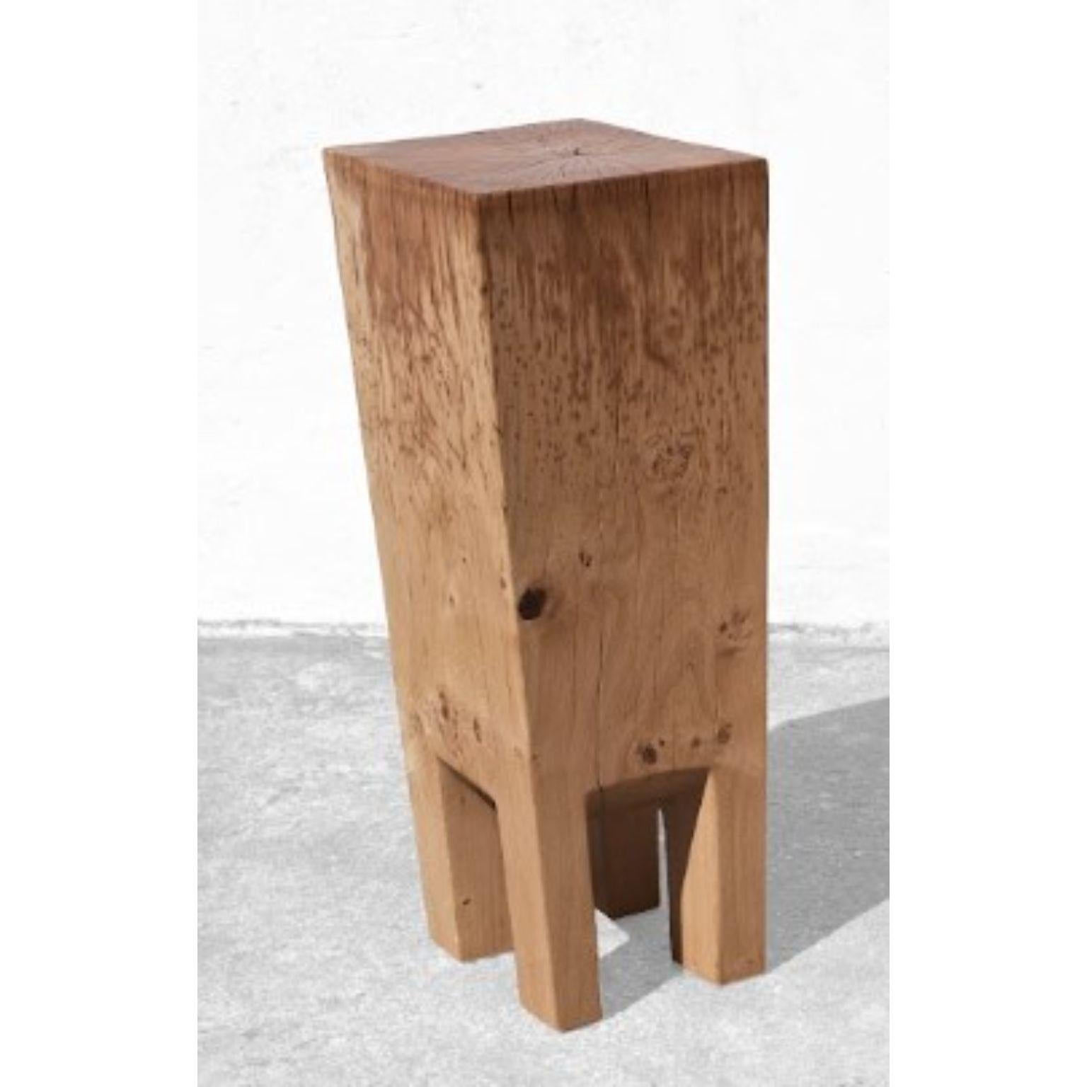 Sculpted side table by Jörg Pietschmann
Dimensions: H 86 x W 34 x D 33 cm 

In Pietschmann’s sculptures, trees that for centuries were part of a landscape and founded in primordial forces tell stories inscribed in the memory of their fibers.

The