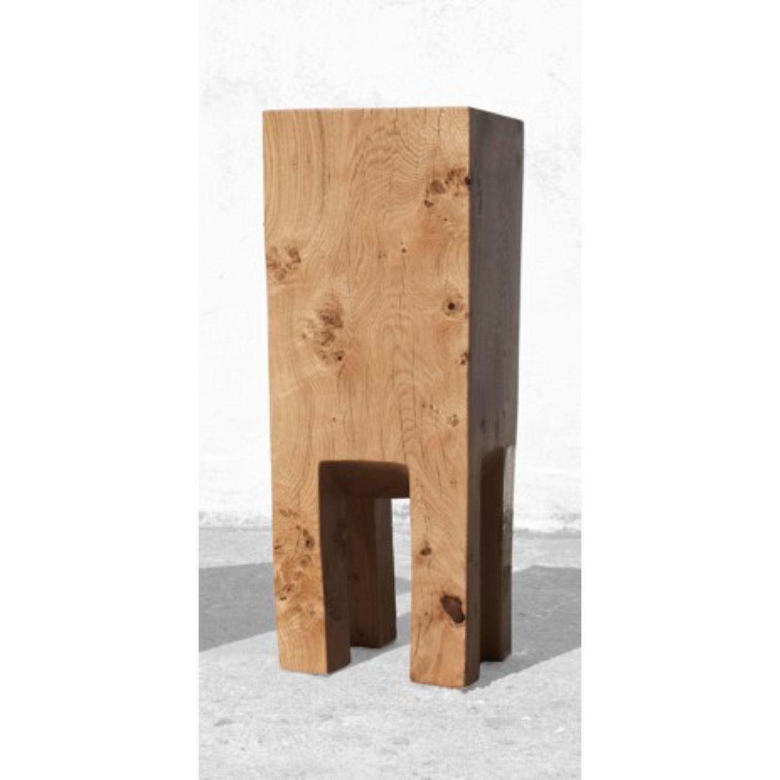 Sculpted side table by Jörg Pietschmann
Dimensions: H 93 x W 37 x D 34 cm

In Pietschmann’s sculptures, trees that for centuries were part of a landscape and founded in primordial forces tell stories inscribed in the memory of their fibers.

The