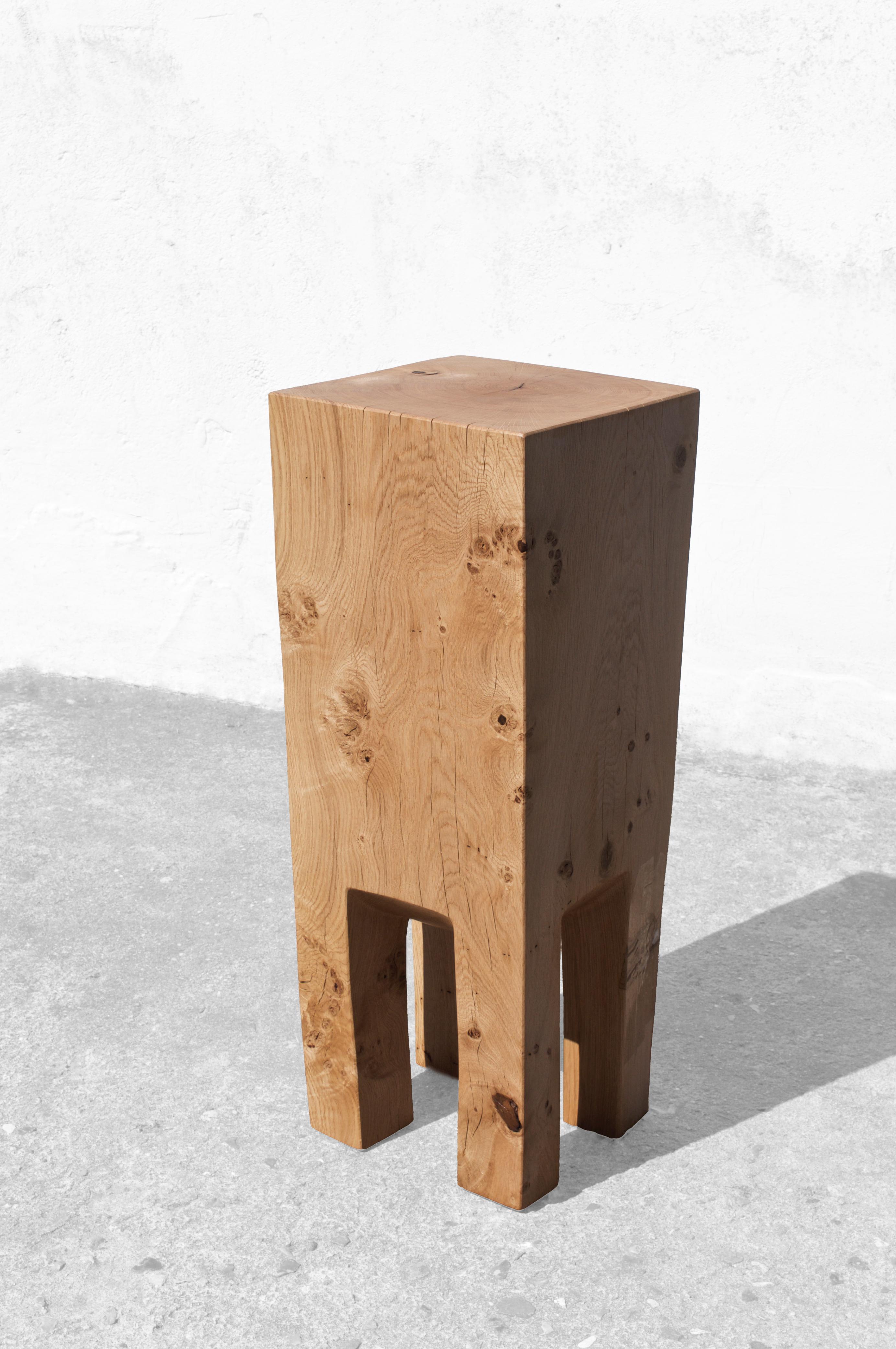 Sculpted side table by Jörg Pietschmann
Dimensions: H 93 x W 37 x D 34 cm

In Pietschmann’s sculptures, trees that for centuries were part of a landscape and founded in primordial forces tell stories inscribed in the memory of their fibers.

The