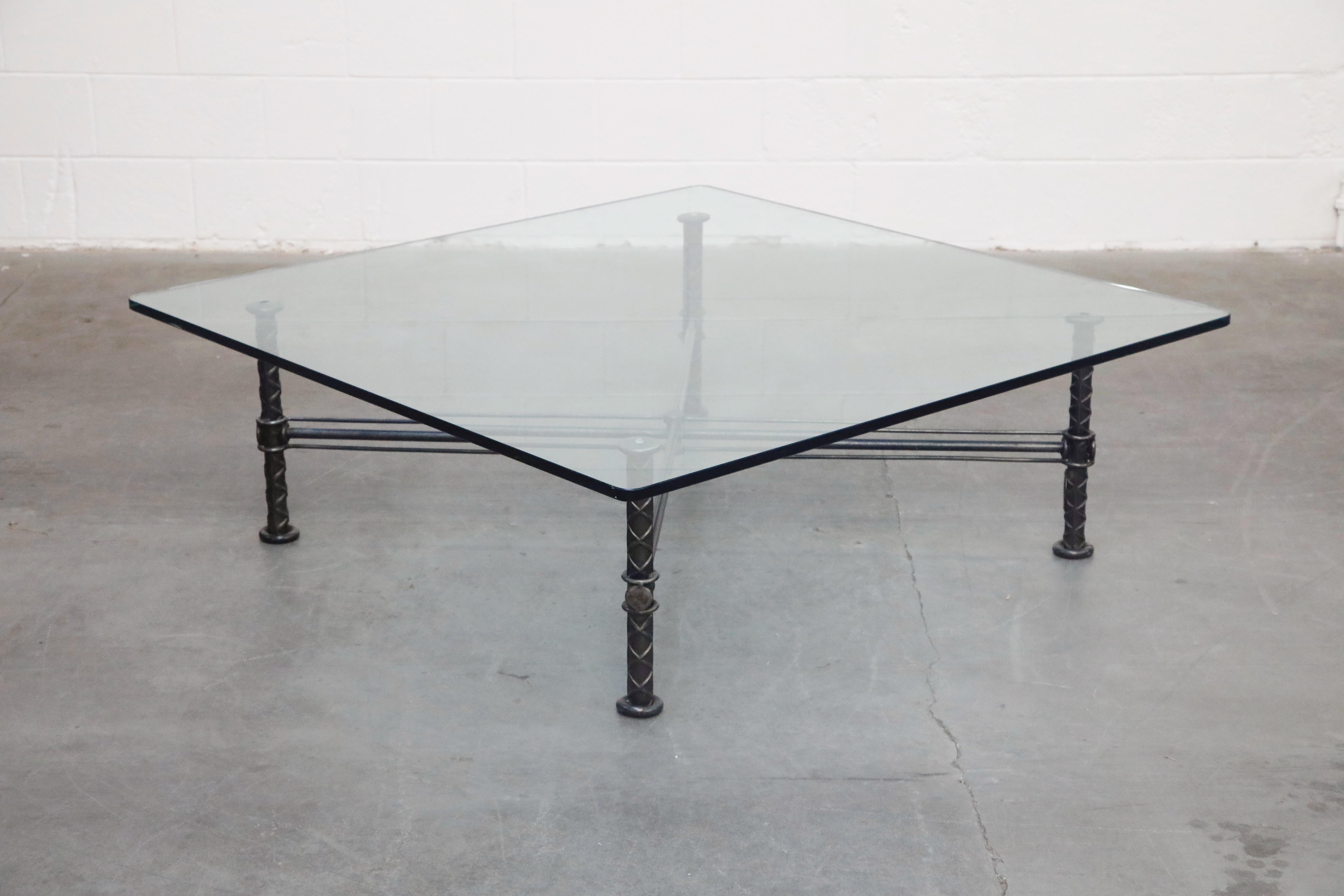 This fascinating sculpted steel coffee table by Israeli artist Ilana Goor is signed and numbered 4 of an edition of 100, is in incredible showroom condition, and ready to grace the interior of a designer home. 

This large 52