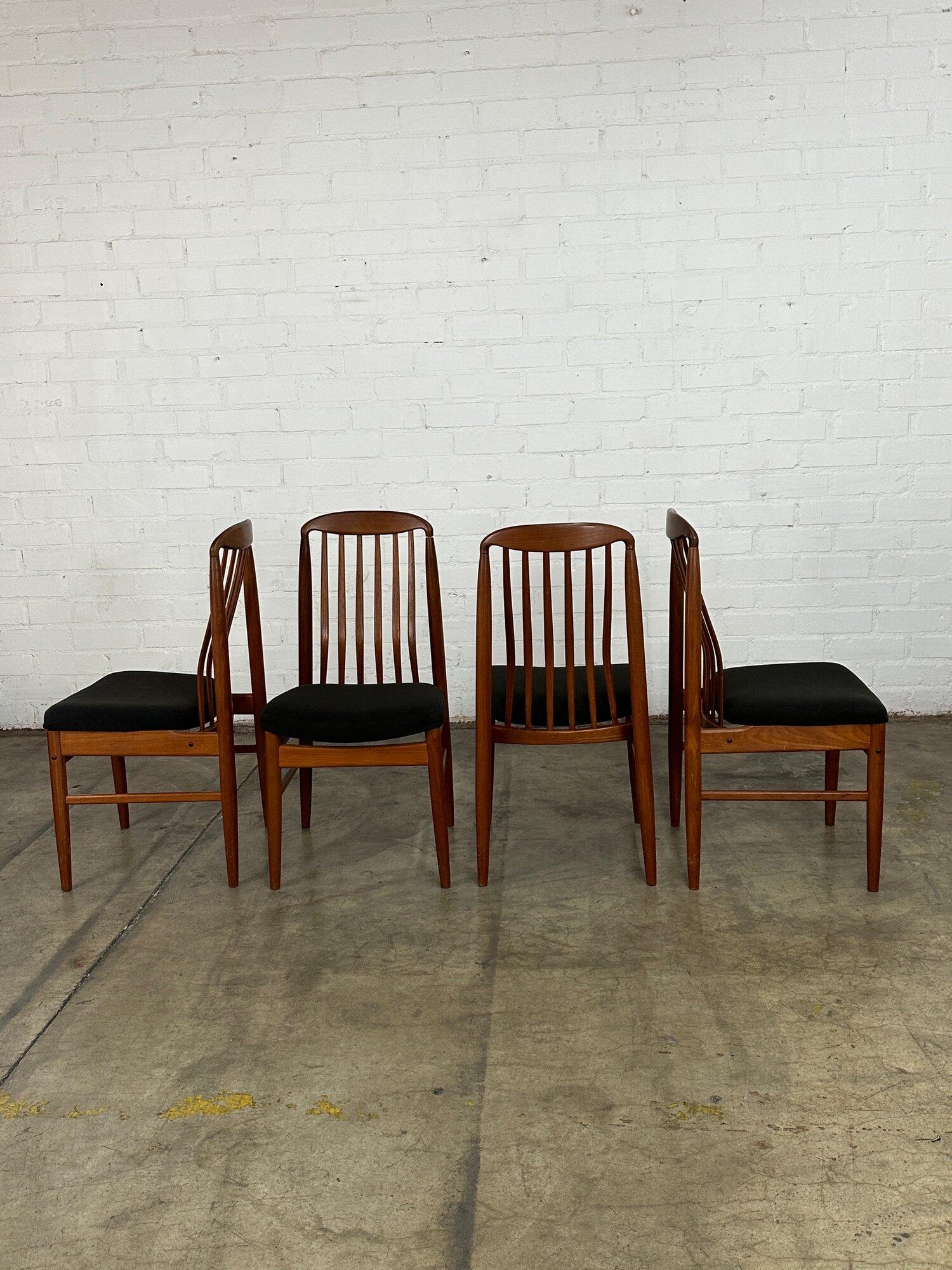 Mid-Century Modern Sculpted teak dining chairs- set of four For Sale