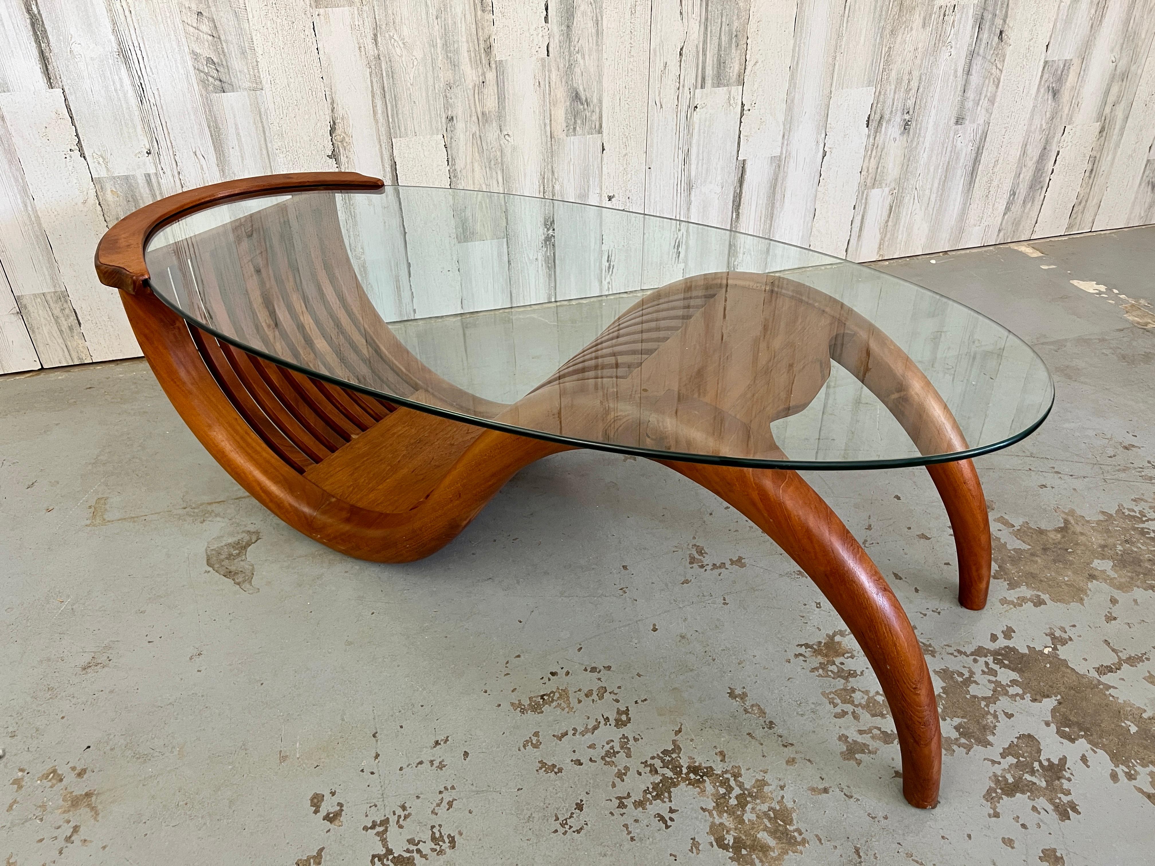 Scandinavian Modern Sculpted Teak with Oval Glass Coffee Table For Sale