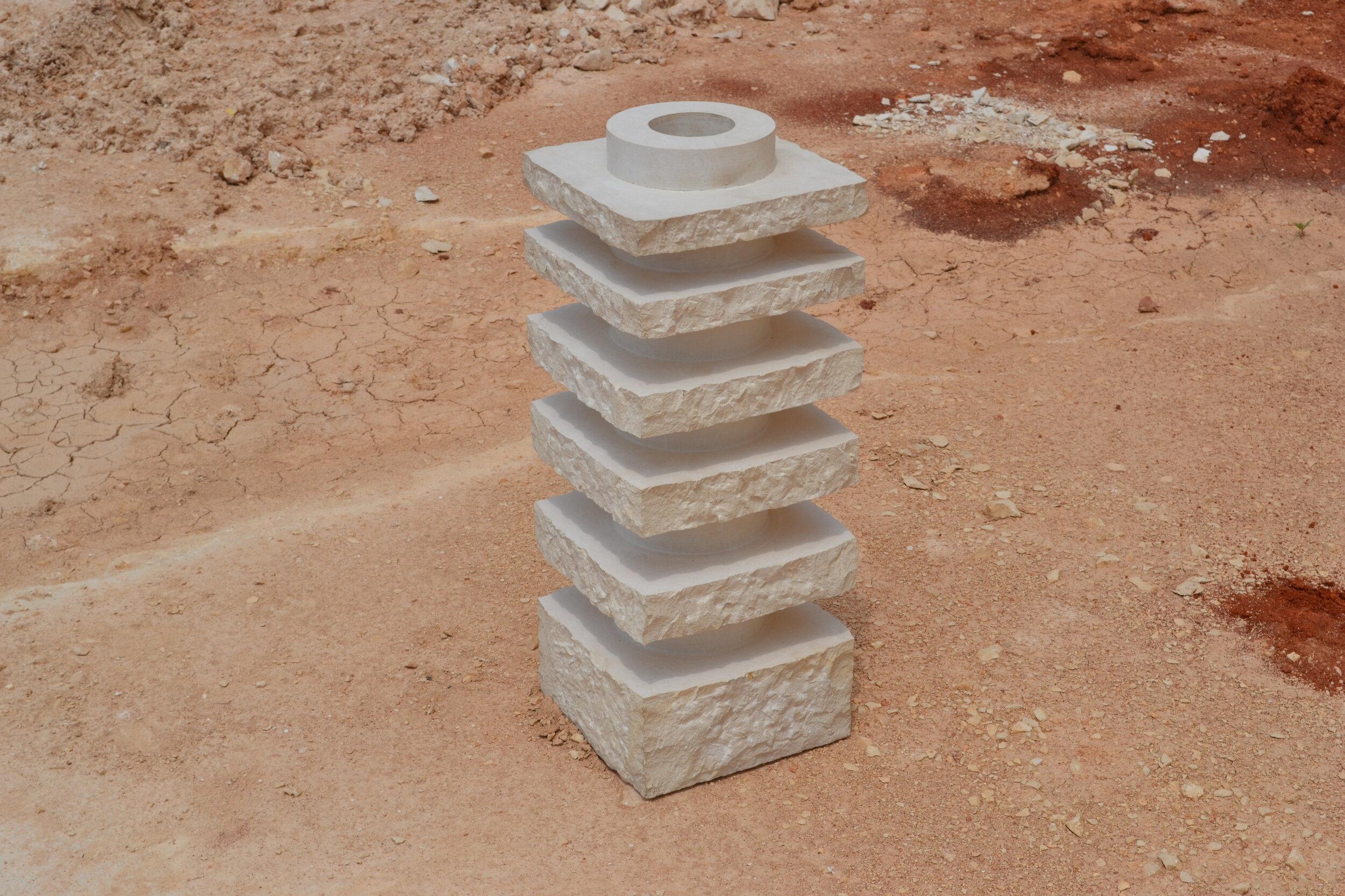 Single piece limestone block. Machine and handcrafted.

*Opening depth: 36cm with a diameter of 8cm.

On the side of the vase at bottom level there is a small opening closed with a metal screw intended for letting the water out. The vase can be