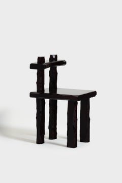 Sculpting Archetypes chair in carved and laquered wood by Linde Freya Tangelder