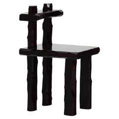 Sculpting Archetypes chair in carved and laquered wood by Linde Freya Tangelder