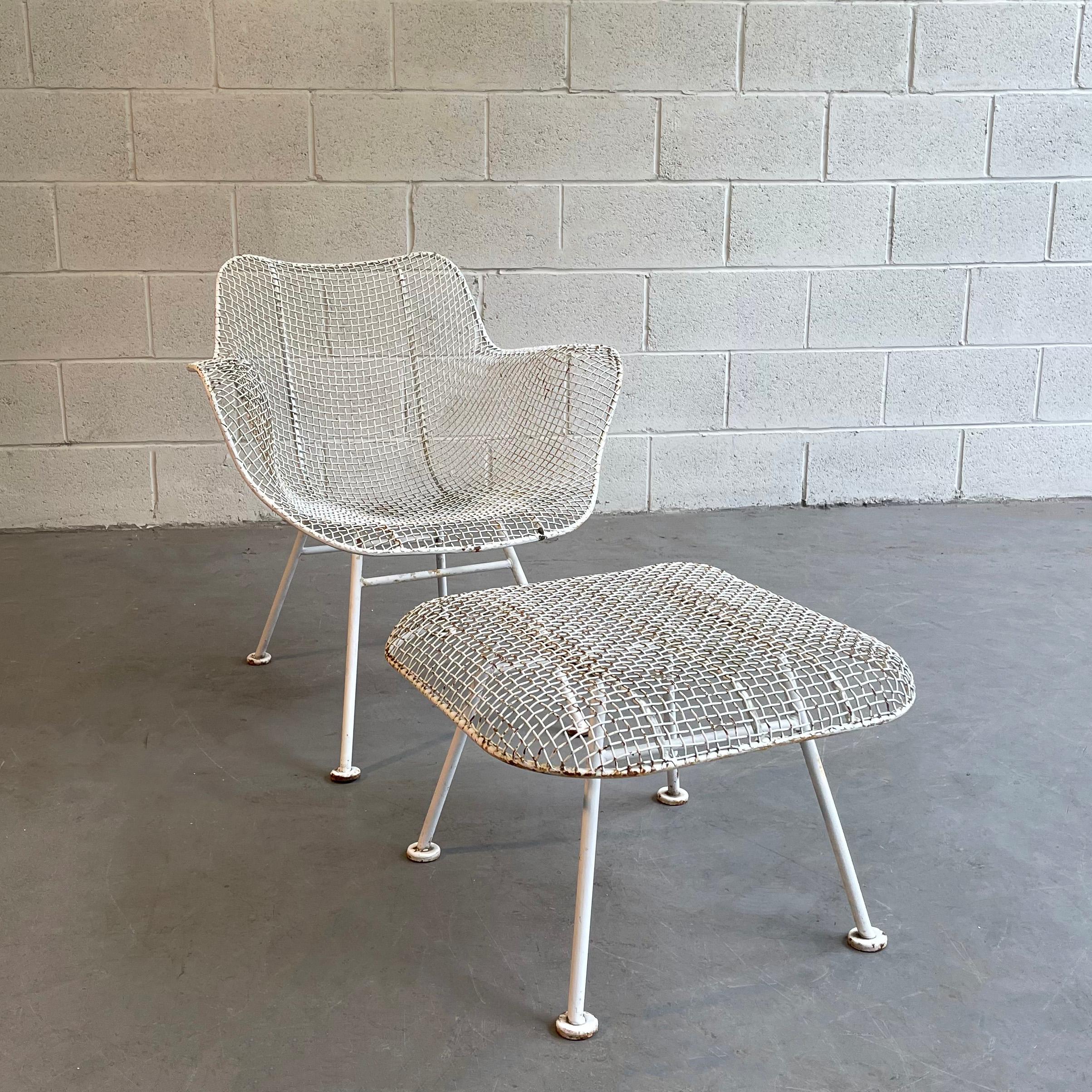 Mid-Century Modern, outdoor, patio, powder-coated, steel mesh and wrought iron armchair with ottoman by Russell Woodard, Sculptura. The ottoman measures 21 width x 21 depth x 13 inches height.
