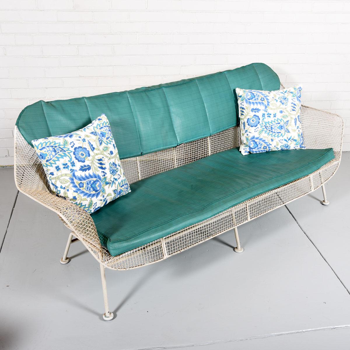 Sculptura Sofa by Russell Woodard, 1950s

Additional information:
Material: Iron, Woven steel
Purchased in the 1950’s, the sofa was delivered directly into a newly constructed enclosed back patio — and it never moved, until we were fortunate