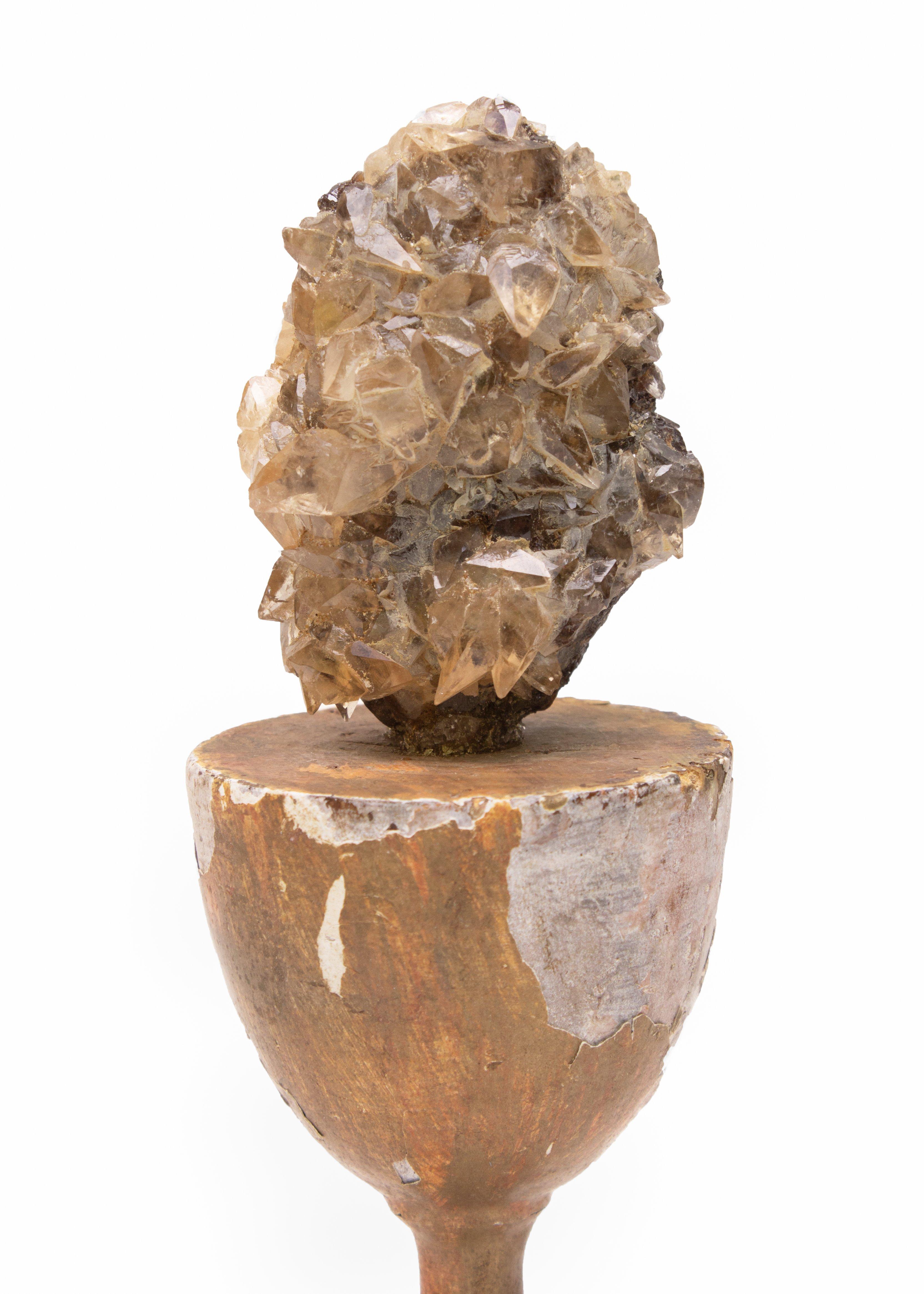 Sculptural 18th century Italian wood chalice decorated with calcite crystals in sphalerite on a Lucite base. The hand carved and painted chalice is from a church in Liguria, Italy. The calcite crystals formation comes from Elmwood Mine,