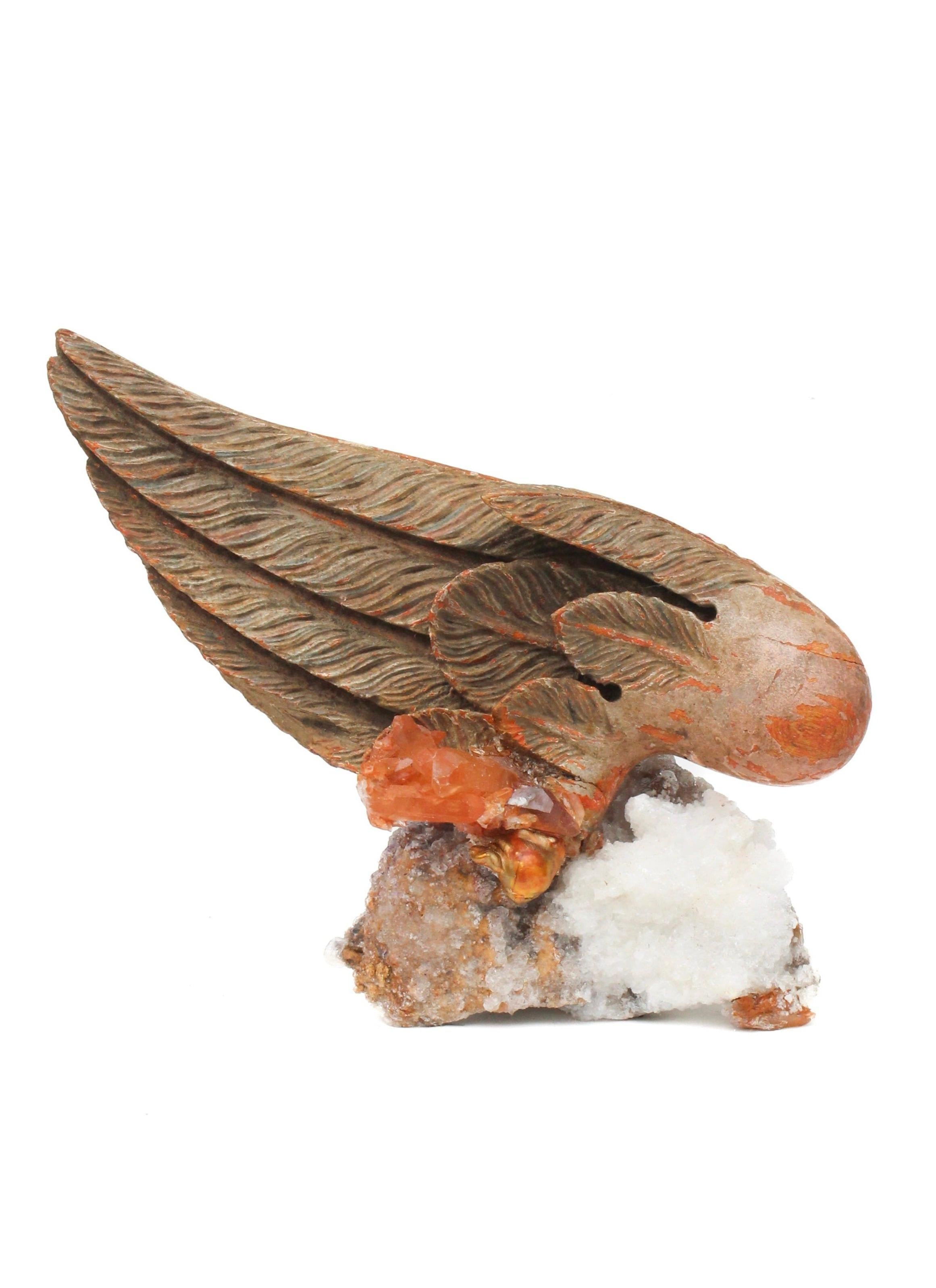 Sculptural 18th century Italian hand-carved angel wing mounted on aragonite and adorned with tangerine quartz crystals and a baroque pearl. 

The hand-carved angel wing was once part of a heavenly, angelic depiction in a historic church in Italy.
