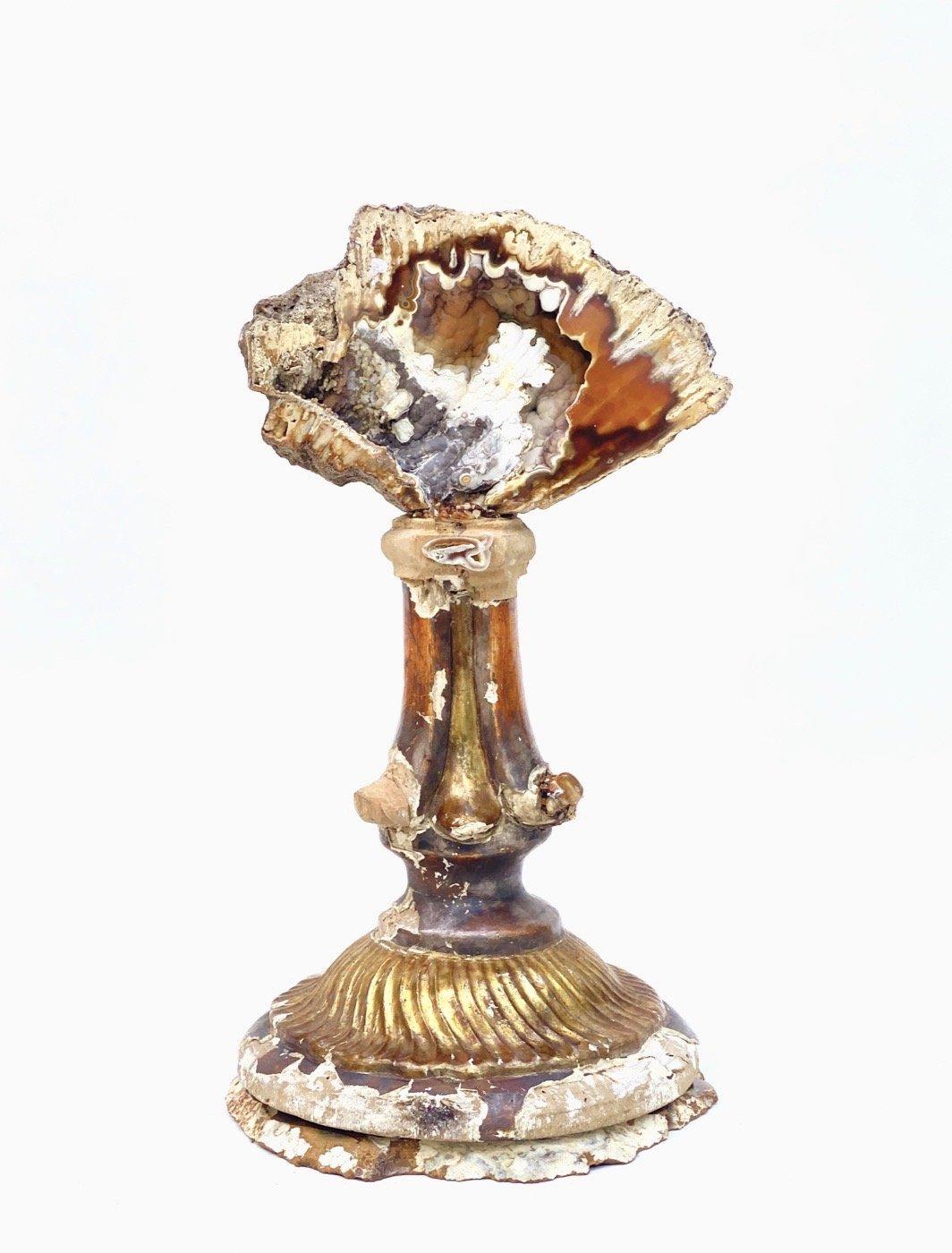 18th century Italian candlestick base with agatized coral on a polished agate base.

The 18th century hand carved, painted, and gold-leafed candlestick is originally from Tuscany. The polished agate coral coordinates exactly with the 18th century