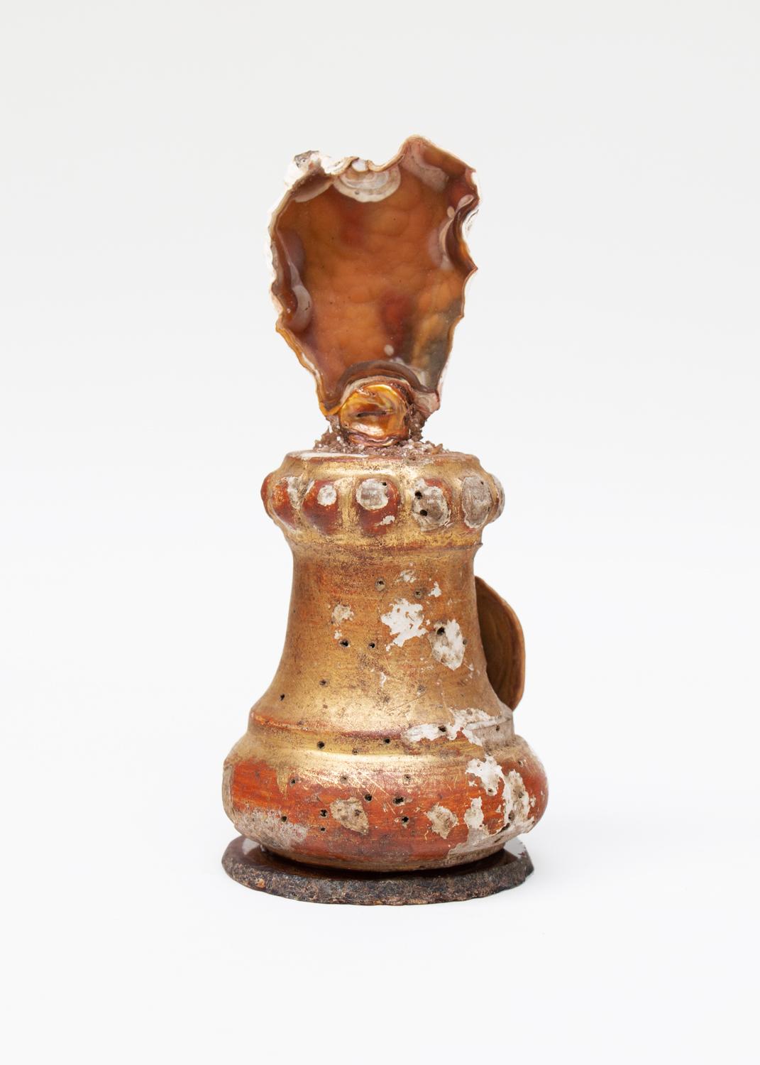 Sculptural 18th century Italian miniature fragment with fossil agate coral.

The fragment was originally part of an 18th century Italian candlestick from a historic church. It has the original gold leaf and red bole paint that coordinates with the