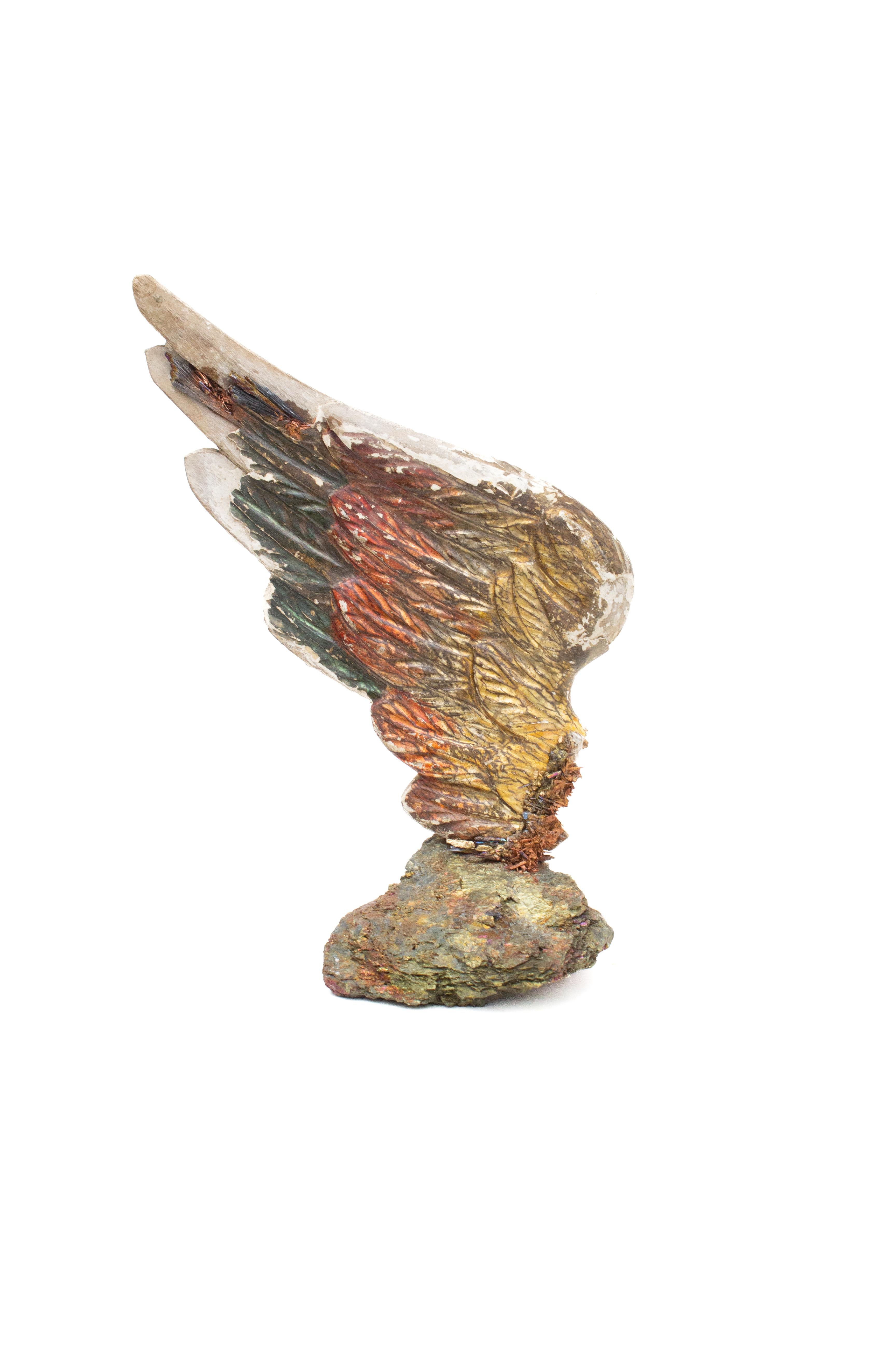 Sculptural 18th century Italian hand-carved angel wing mounted on a chalcopyrite and adorned with kyanite. The hand-carved angel wing was once part of a heavenly, angelic depiction in a historic church in Tuscany. The paint and gilding is original