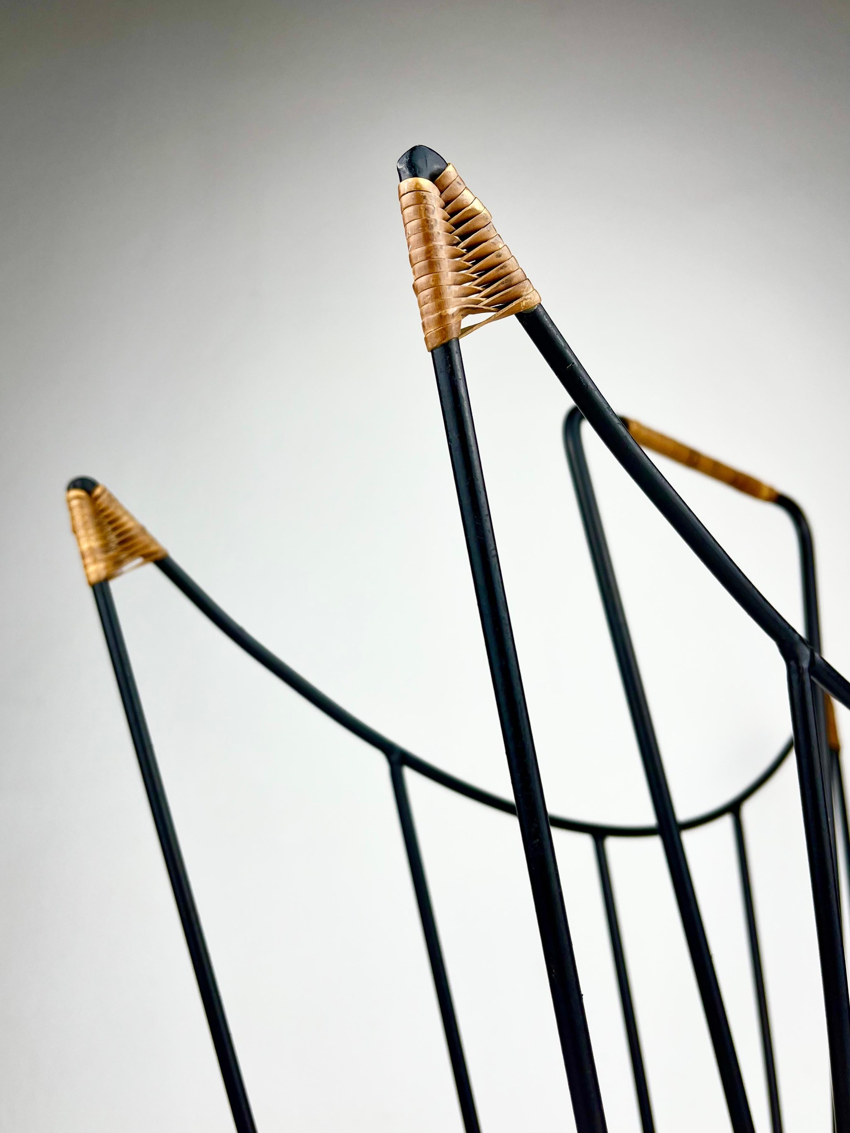 Sculptural 1950s metal magazine rack with twisted rattan details Laurids Lonborg For Sale 5