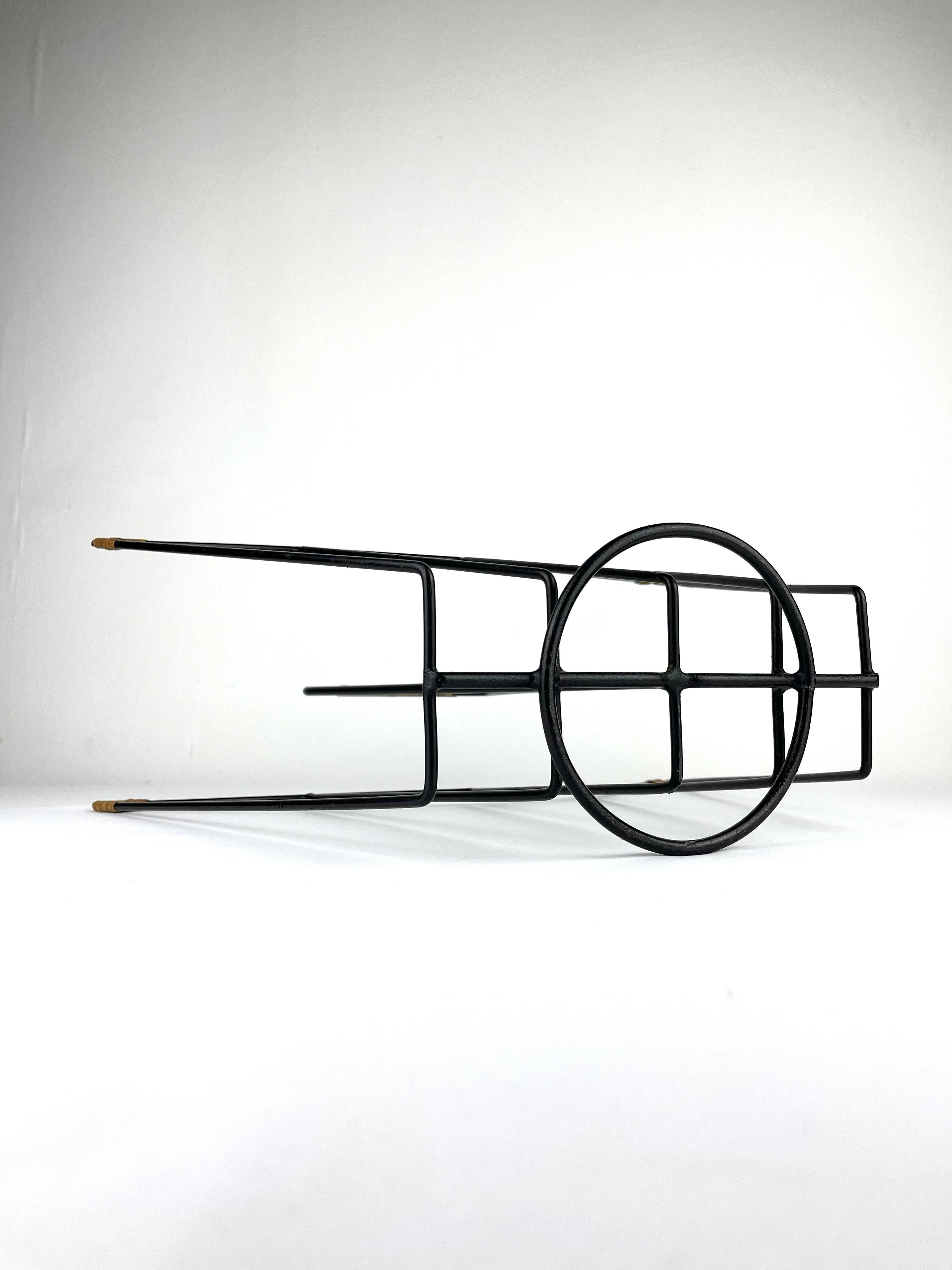 Metal Sculptural 1950s metal magazine rack with twisted rattan details Laurids Lonborg For Sale