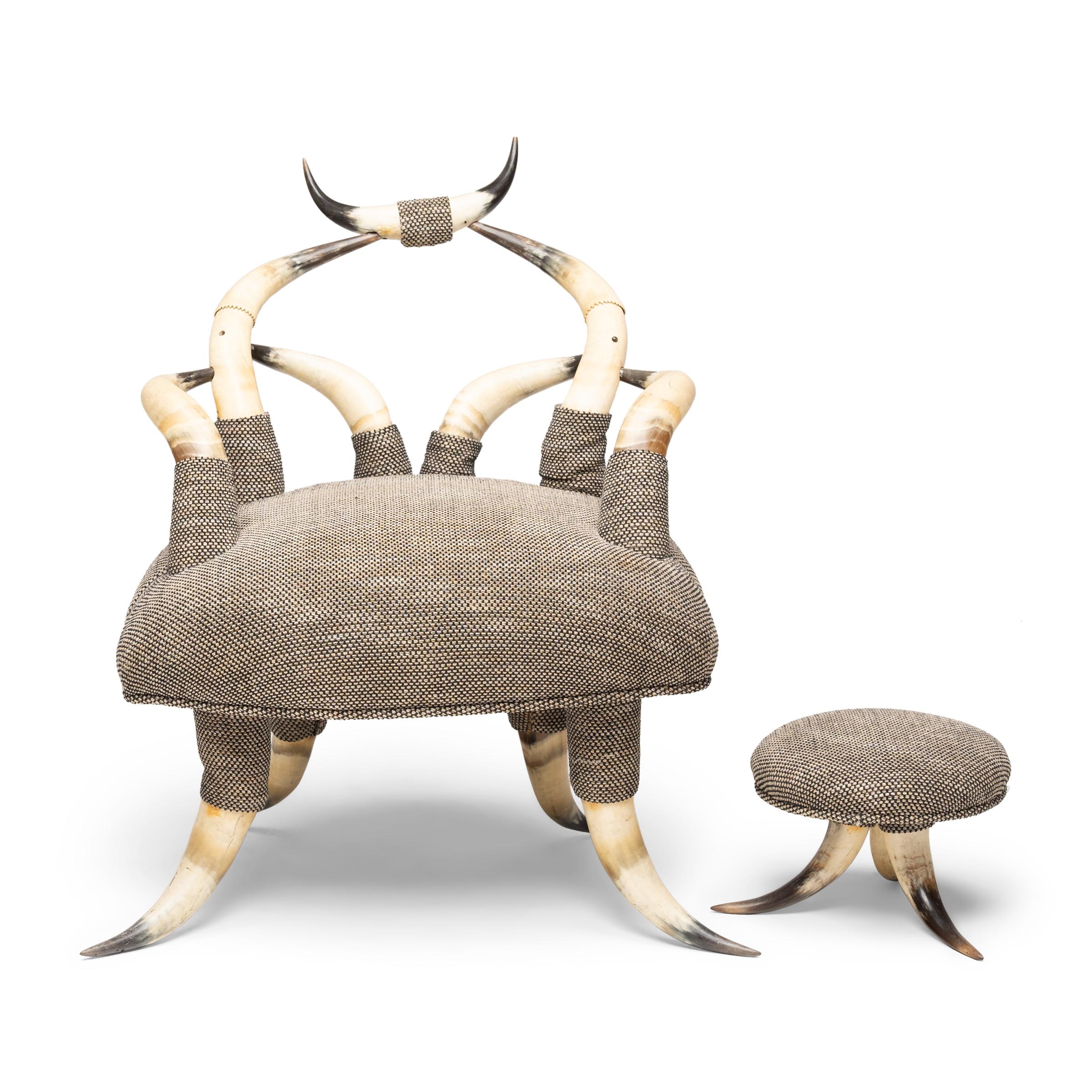 A sculptural armchair and matching footstool from the late 19th century, artfully assembled from the curving forms of American cattle horns. At once delicate and dramatic, the chair has a captivating silhouette of sloping lines and sinuous curves,