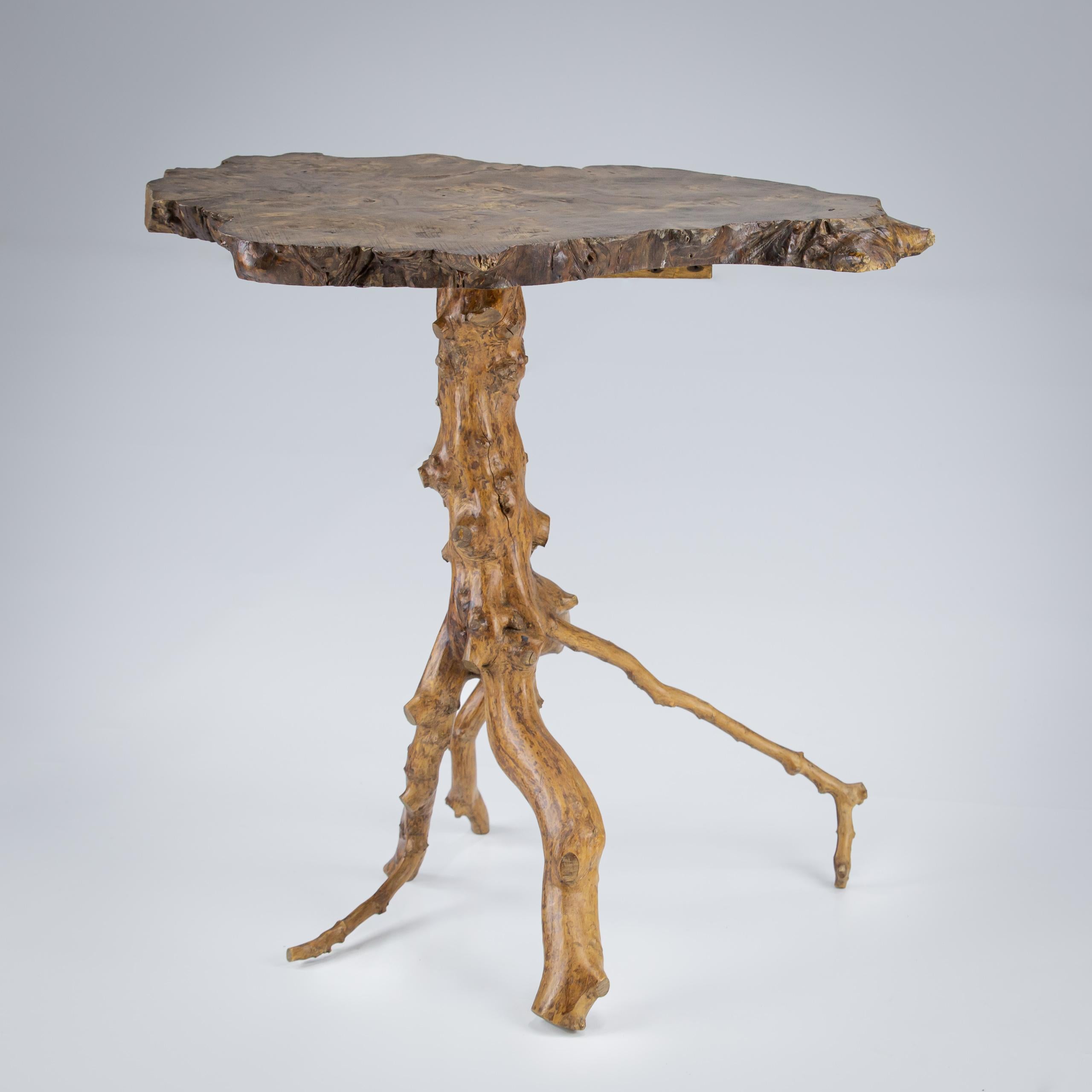 Impressive Grotto Table, naturalistic sculptural support with elm slab top. France, Circa 1970.