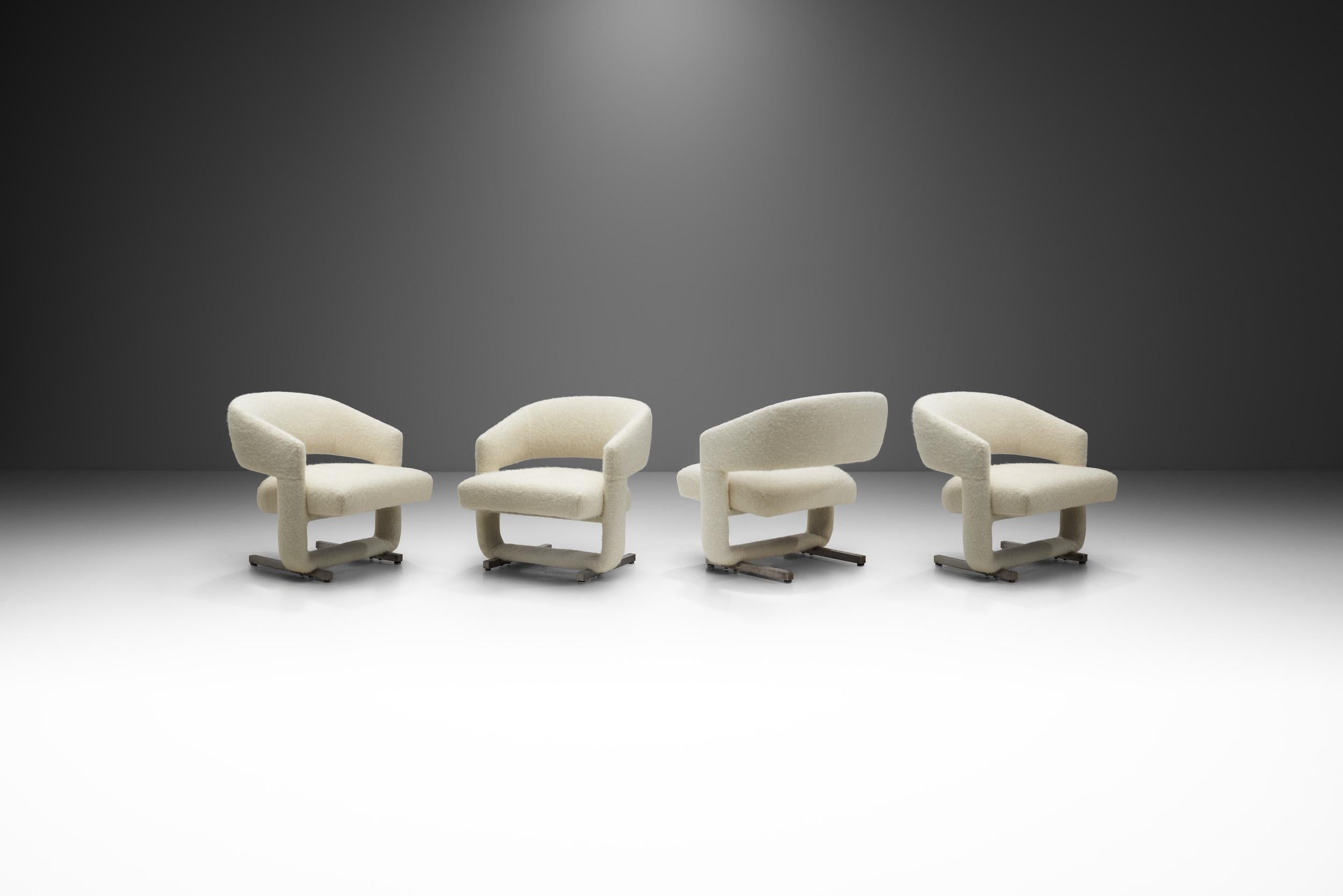 Among the many excellent European mid-century modern designs, some were well-known for their flair for the dramatic, which becomes evident upon looking at this set of four accent chairs. In many ways, it transcends the words “unique” or