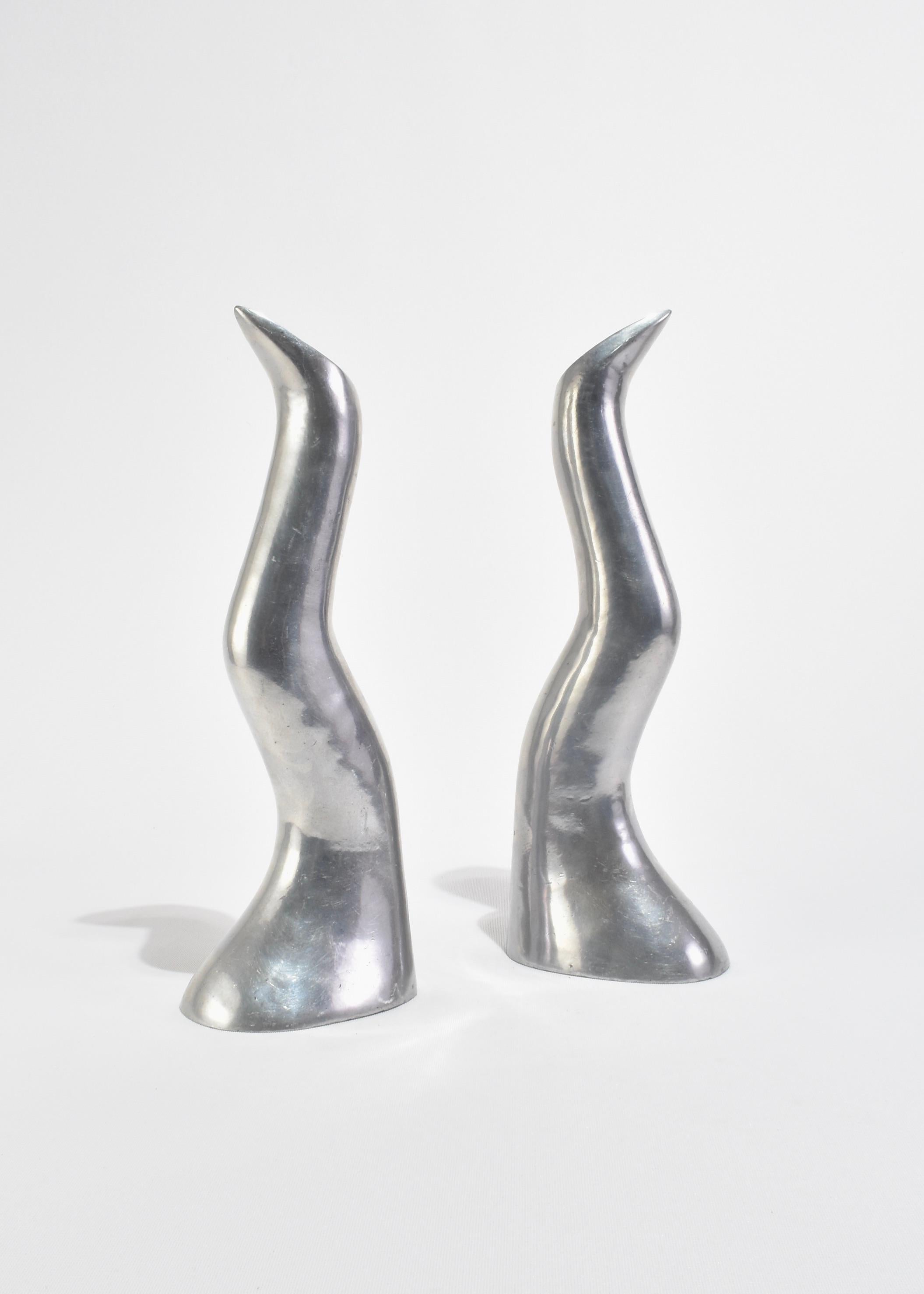 Polished Sculptural Aluminum Candlesticks For Sale