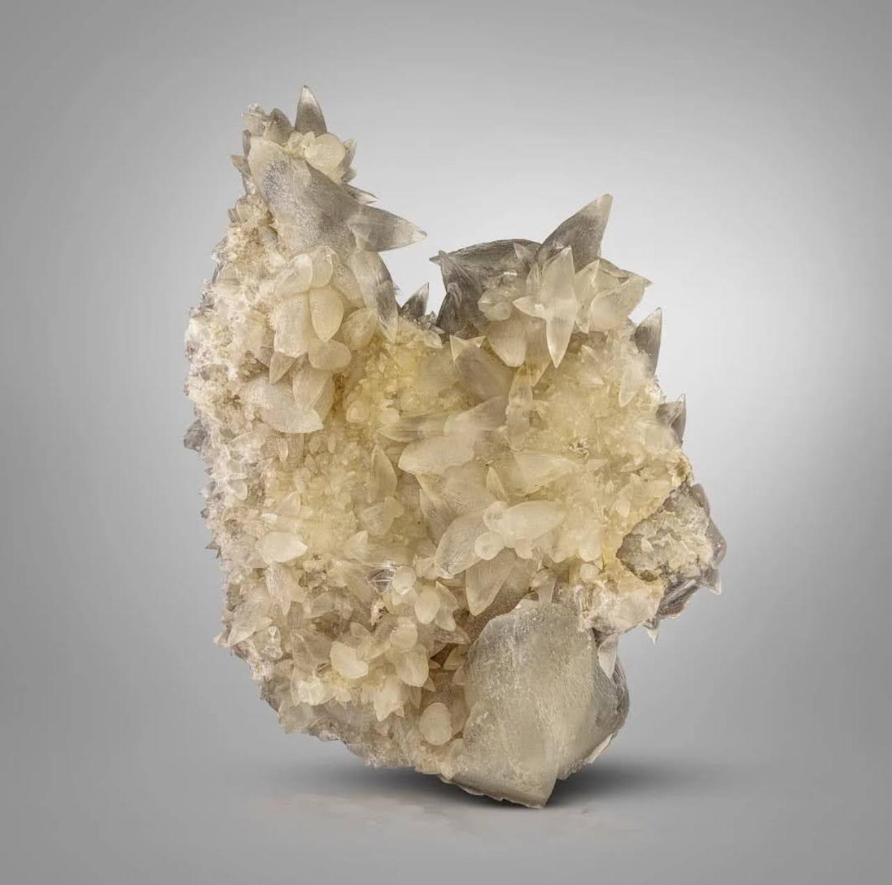 Adam Style Sculptural And Artistic Aggregate Of Twinned Calcite Cluster From Pakistan For Sale