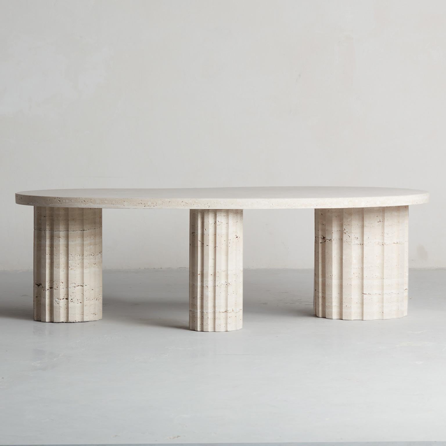 Brutalist sculptural and brutalist Travertine Column coffee table by Aparentment For Sale
