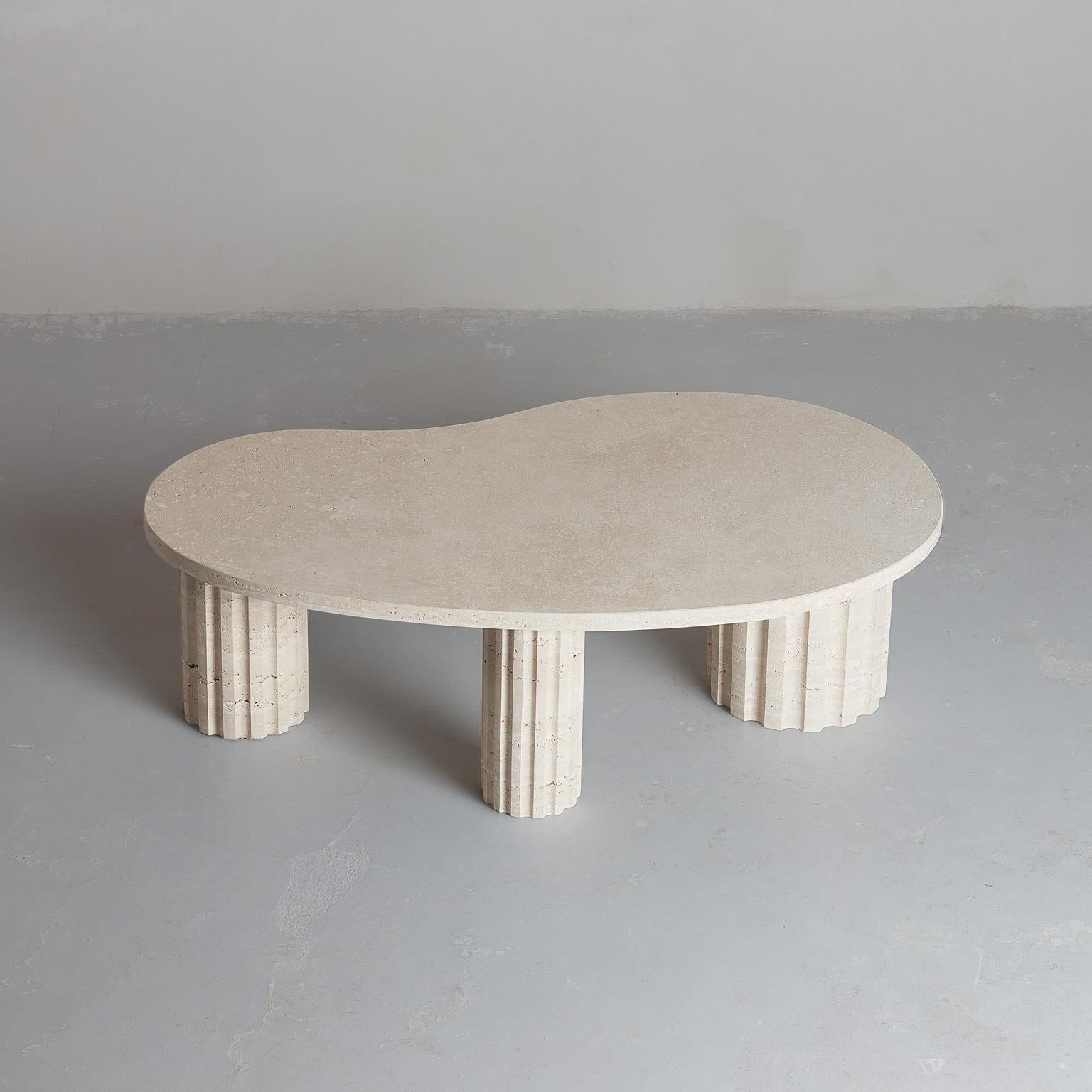 Spanish sculptural and brutalist Travertine Column coffee table by Aparentment For Sale