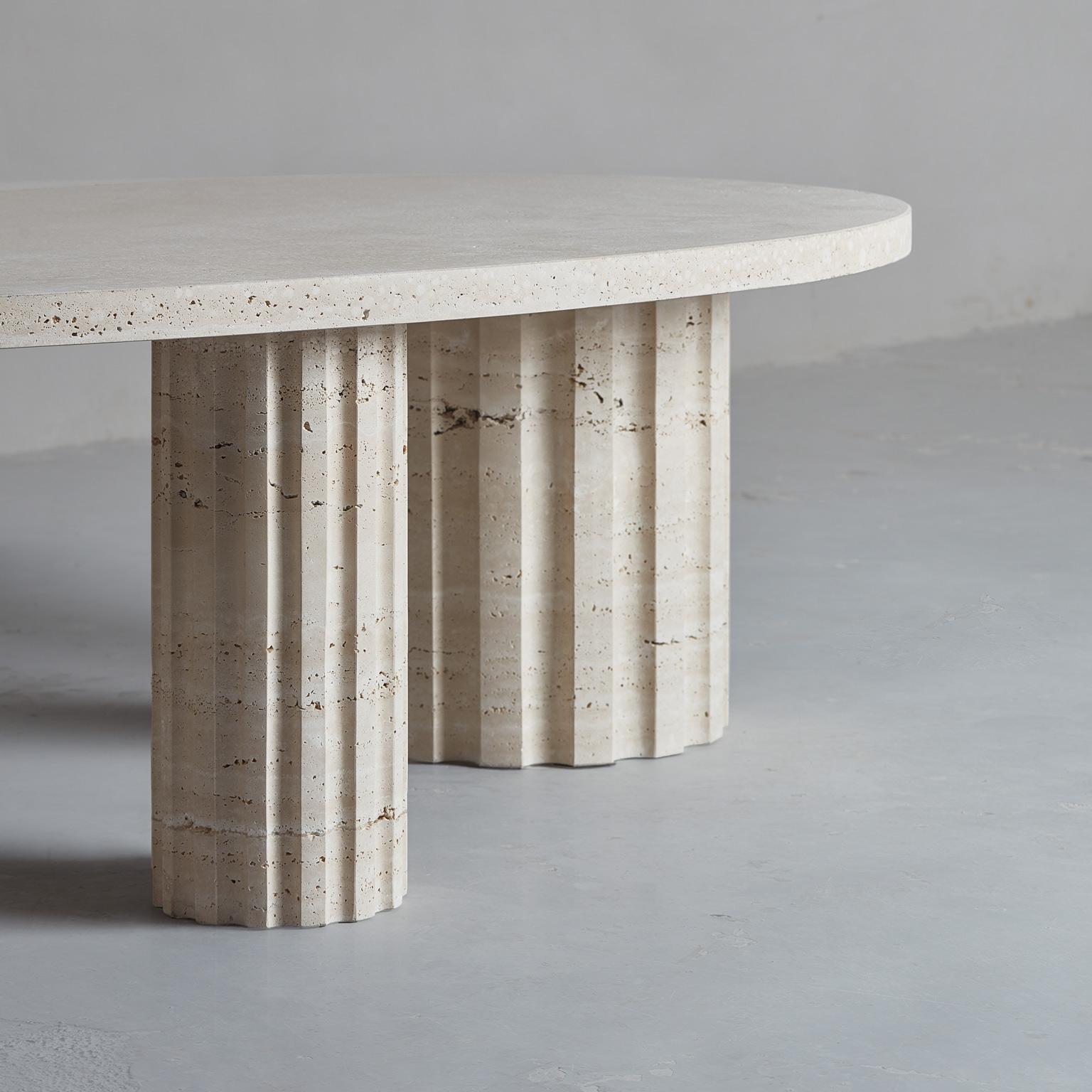 Carved sculptural and brutalist Travertine Column coffee table by Aparentment For Sale