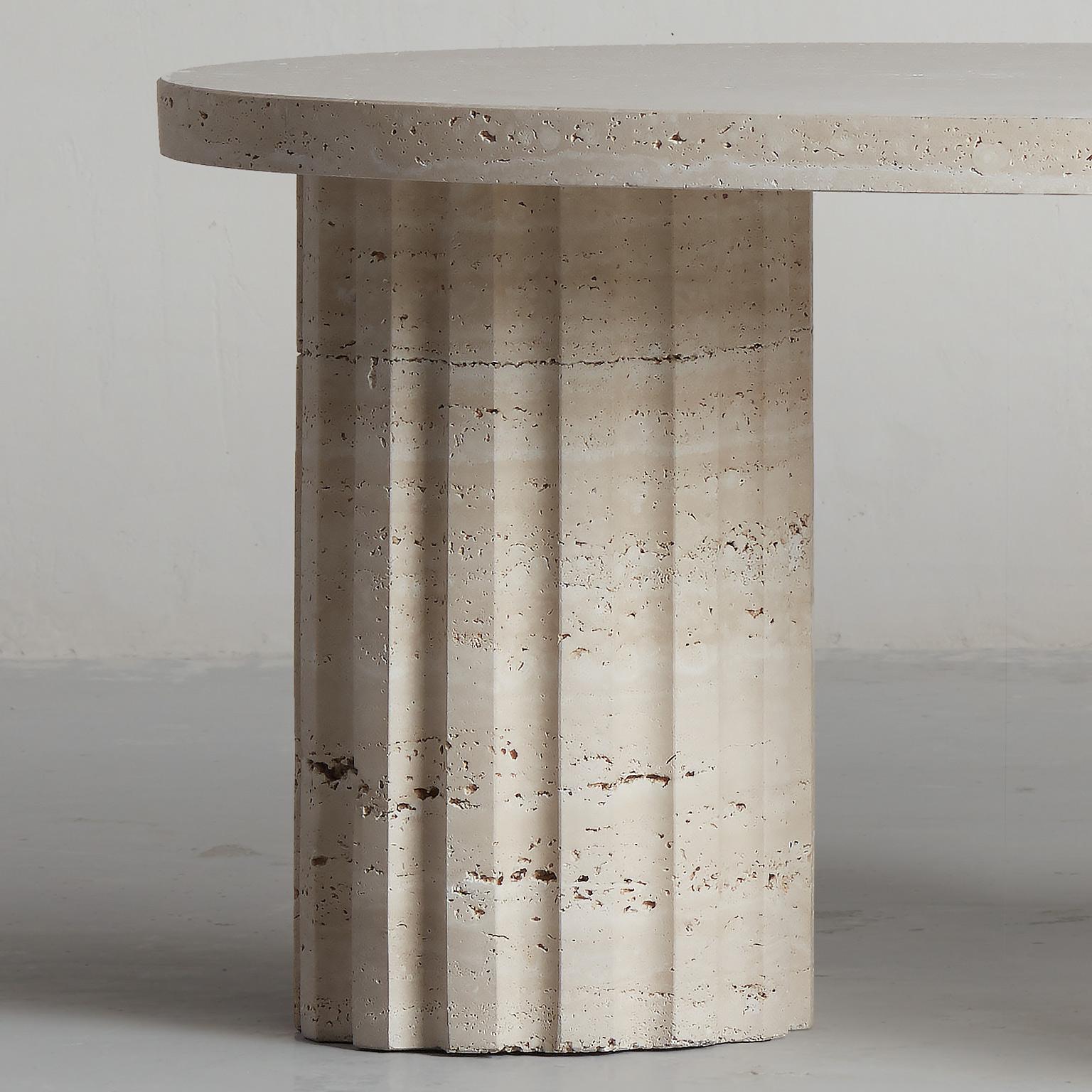 Contemporary sculptural and brutalist Travertine Column coffee table by Aparentment For Sale