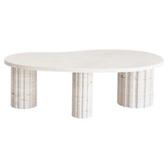 sculptural and brutalist Travertine Column coffee table by Aparentment  