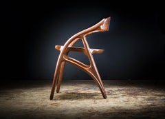 Sculptural and flowing Wapiti Chair in Claro walnut by Erickson Woodworking
