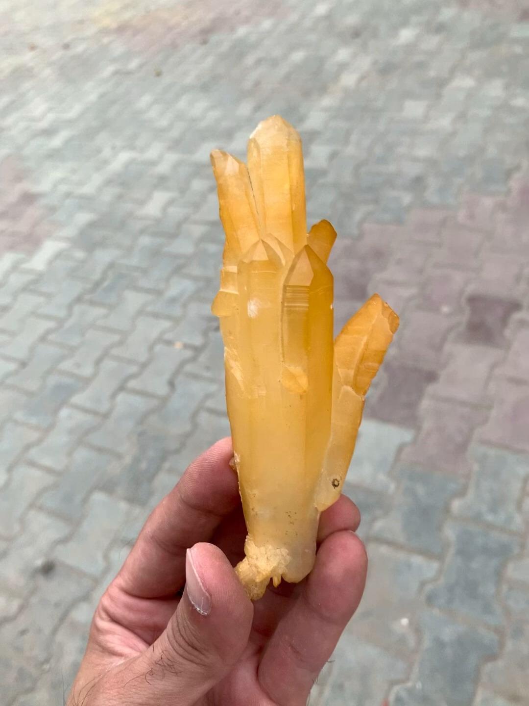 Origin: Zhob District, Baluchistan Province, Pakistan 

Dim: H: 12.5 x W: 5 x D: 2.5 cm

Wt: 112 g

Specimen Type: Sculptural and impressive elongated iron coated Quartz 

Treatment: None 

Color: Yellow 




Iron-oxide coated Faden Quartz is a